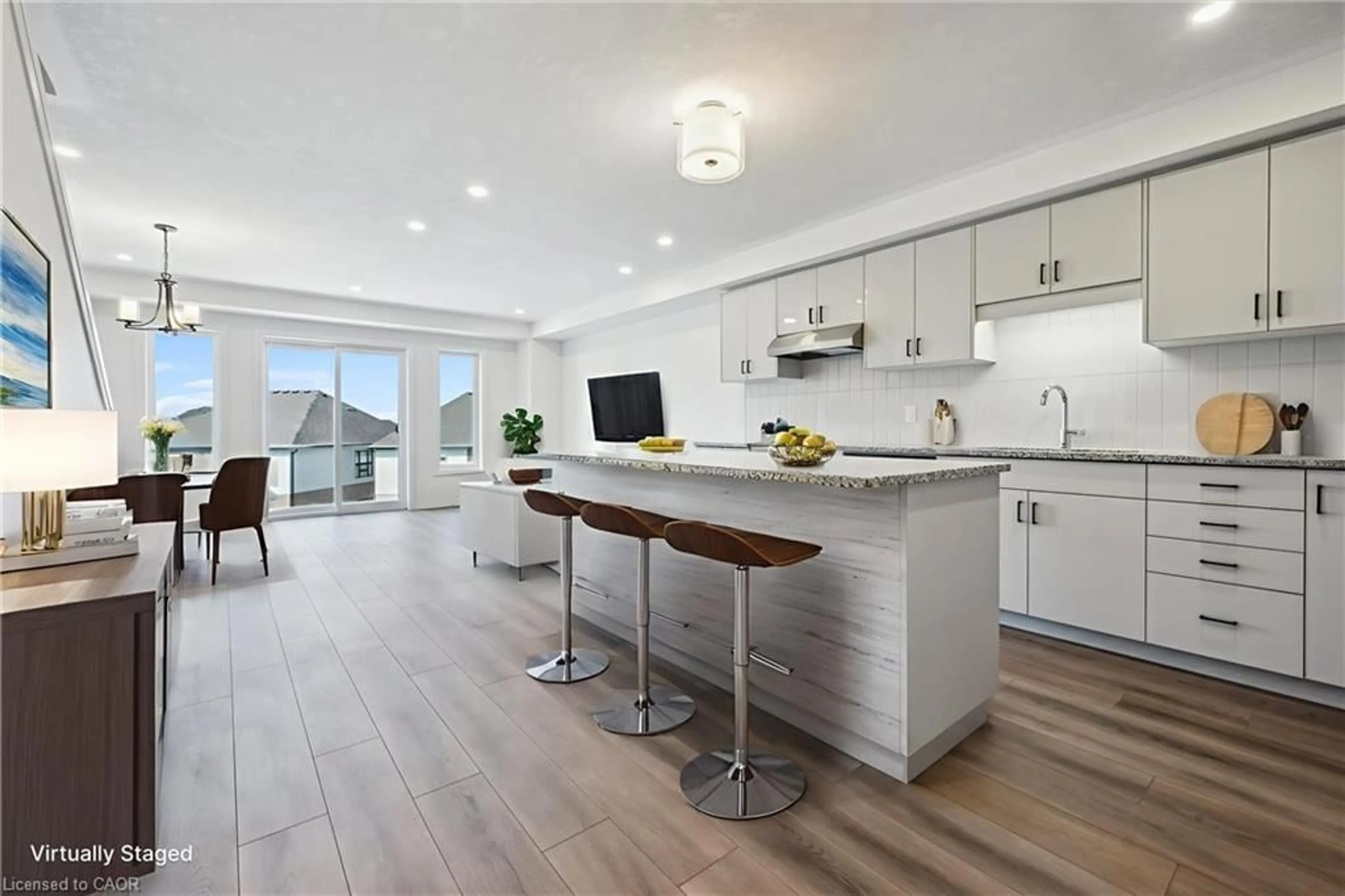 Open concept kitchen, wood/laminate floor for 23 Benninger Dr, Kitchener Ontario N2E 0K4