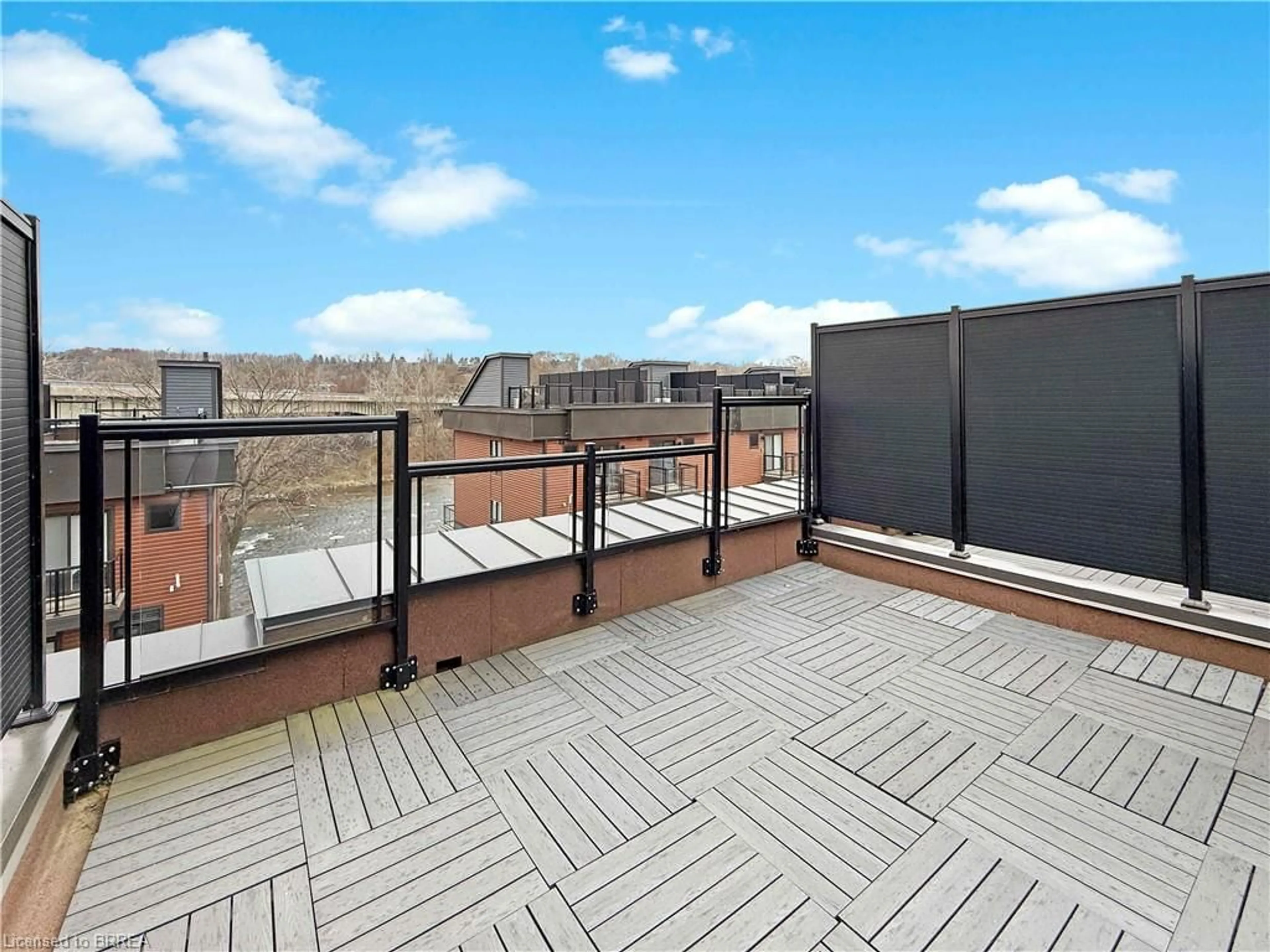 Patio, city buildings view from balcony for 2 Willow St #31, Paris Ontario N3L 0K7