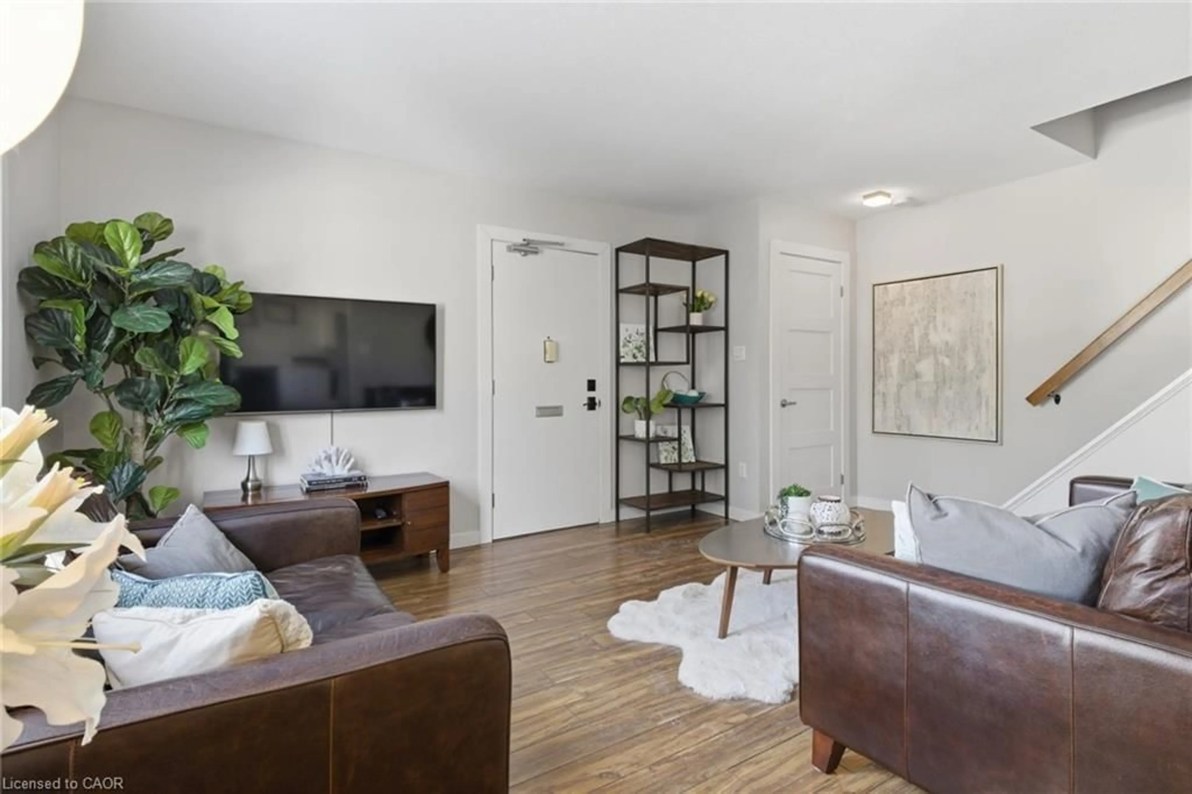 Living room with furniture, wood/laminate floor for 233 Westminster Dr #24, Cambridge Ontario N3H 1T2