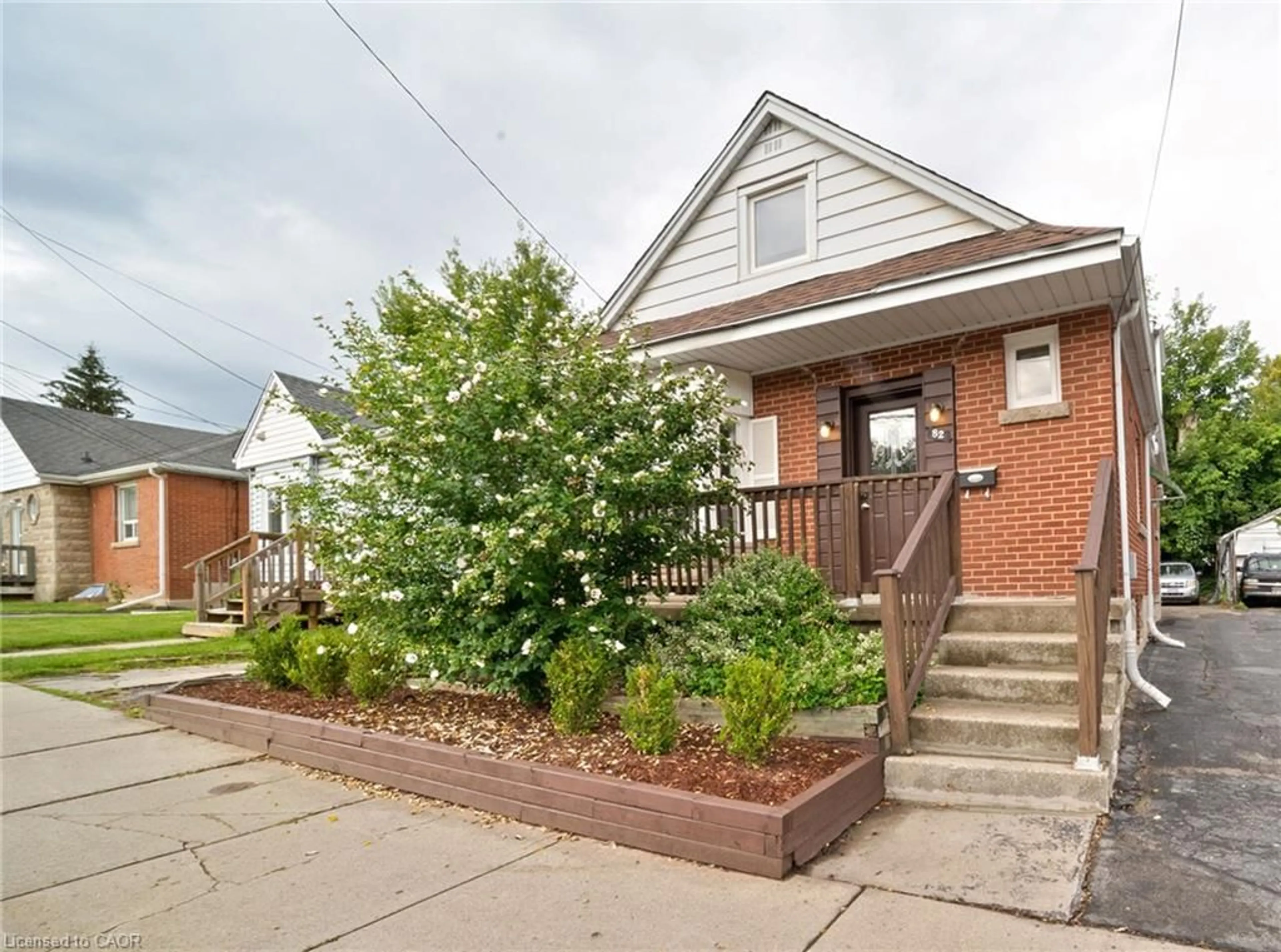 Home with brick exterior material, street for 82 Whitney Ave, Hamilton Ontario L8S 2G5
