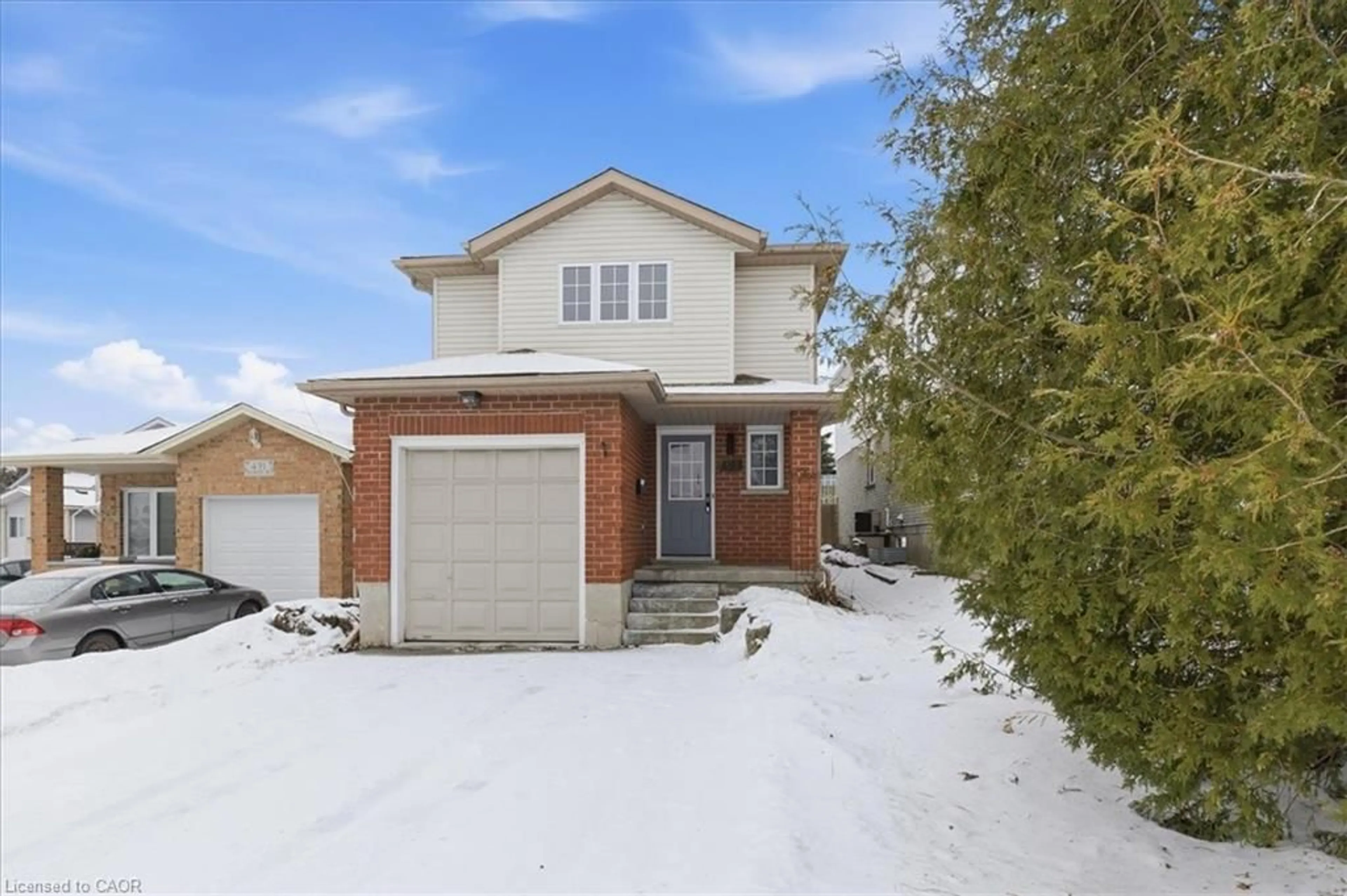 Home with brick exterior material, street for 493 Bankside Dr, Kitchener Ontario N2N 3J3