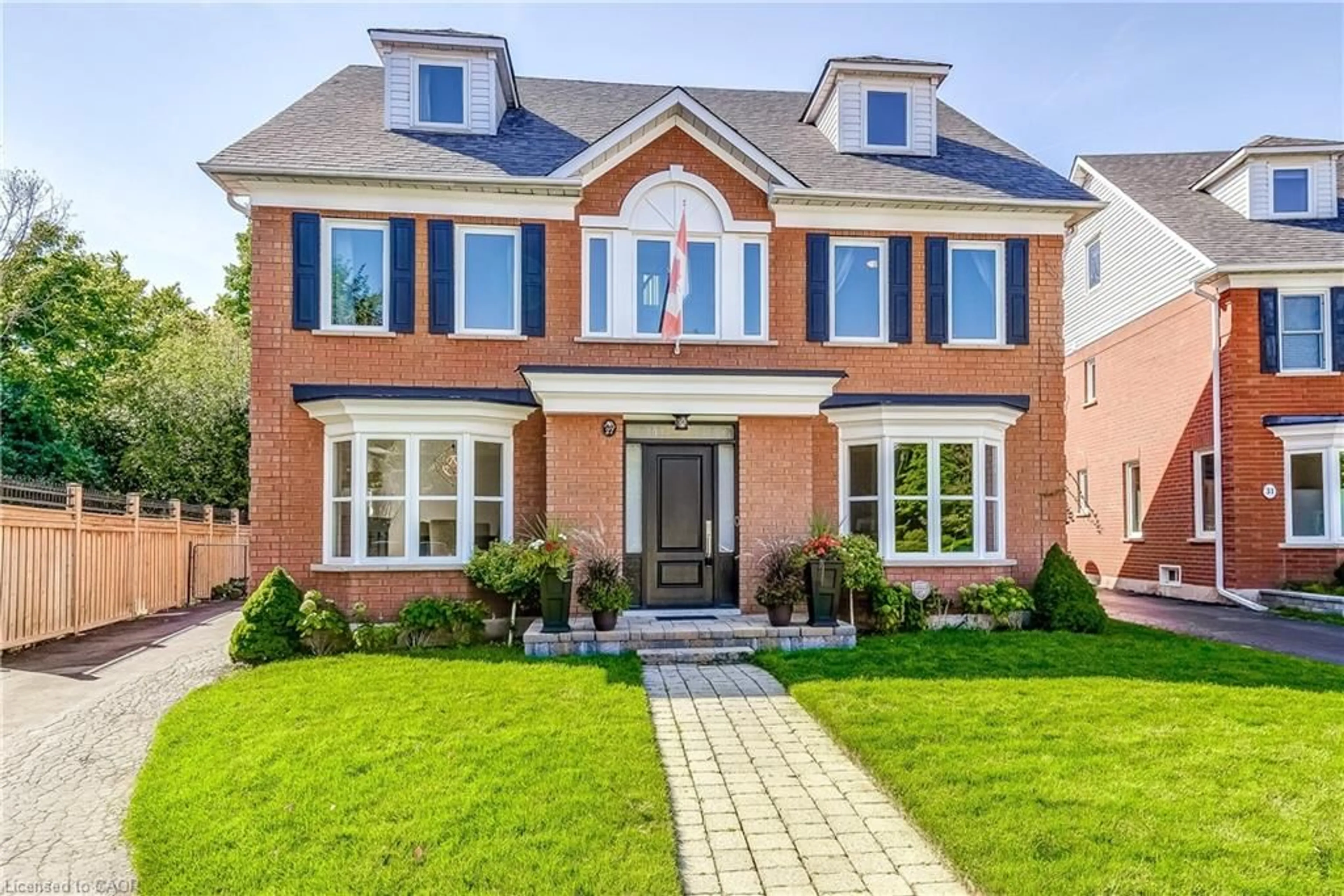 Home with brick exterior material, street for 27 Morrison Creek Cres, Oakville Ontario L6H 4C3