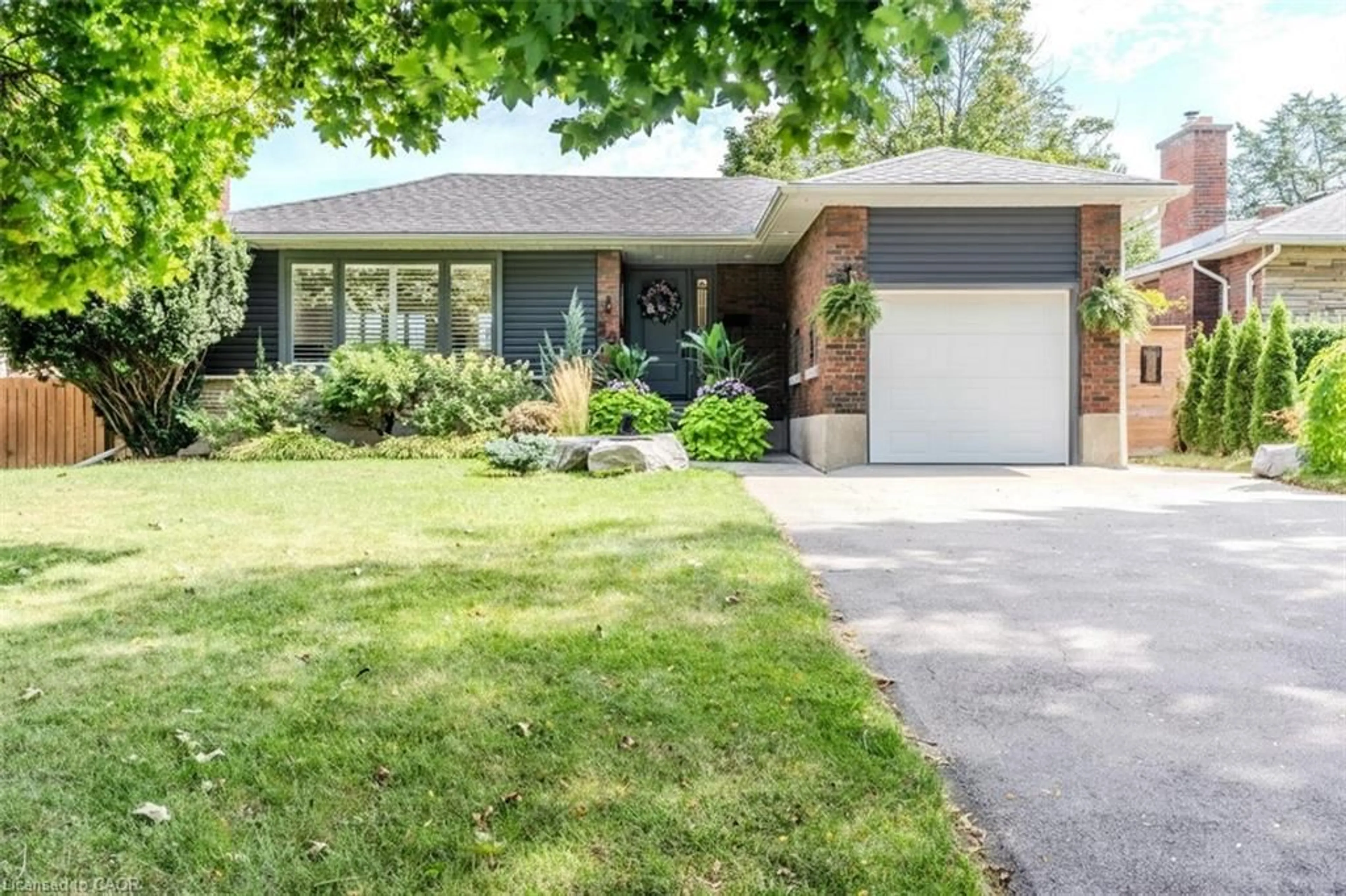 Home with brick exterior material, street for 23 West Hampton Rd, St. Catharines Ontario L2T 3E6
