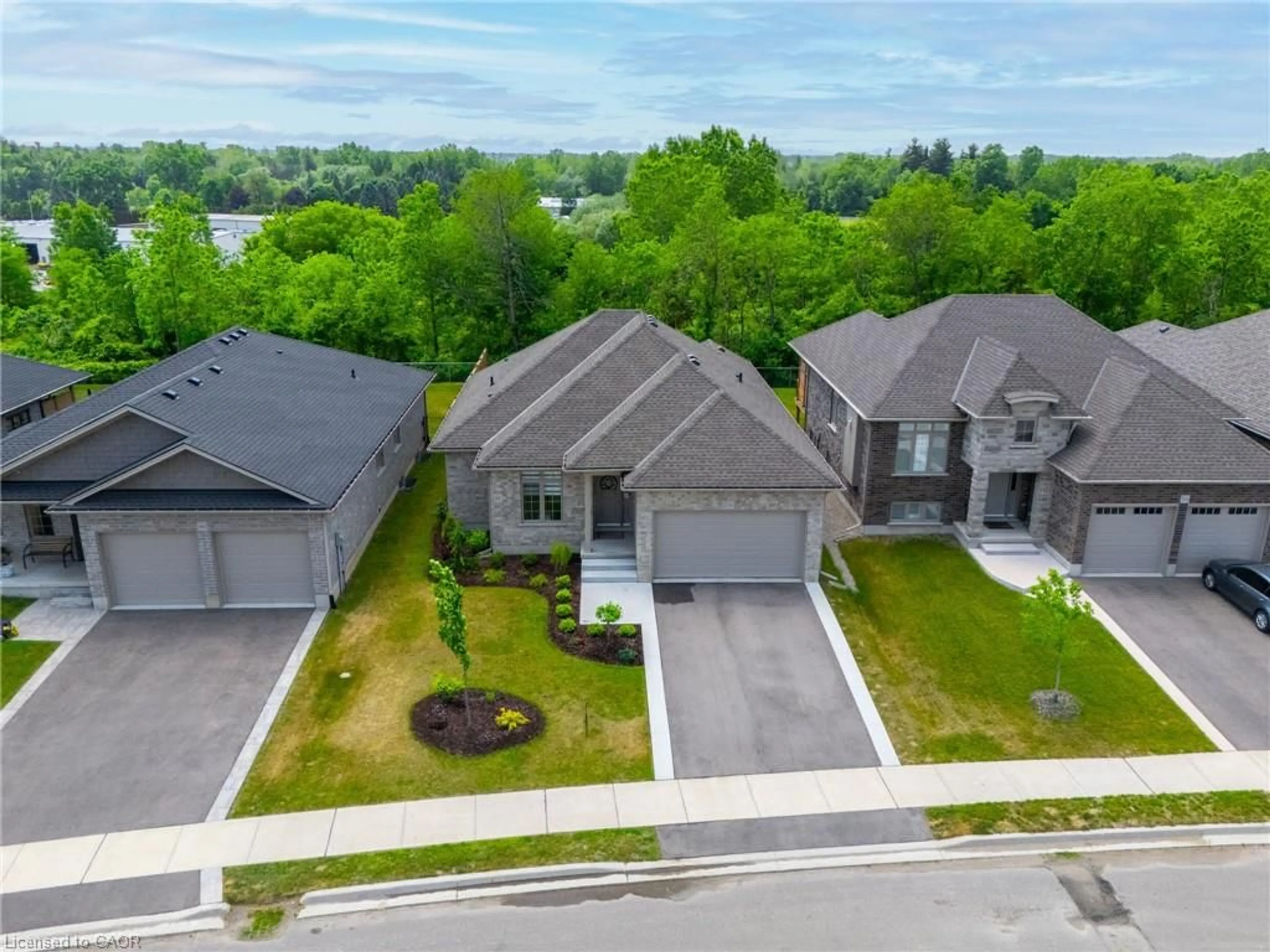 A pic from outside/outdoor area/front of a property/back of a property/a pic from drone, street for 50 Vanrooy Trail, Waterford Ontario N0E 1Y0