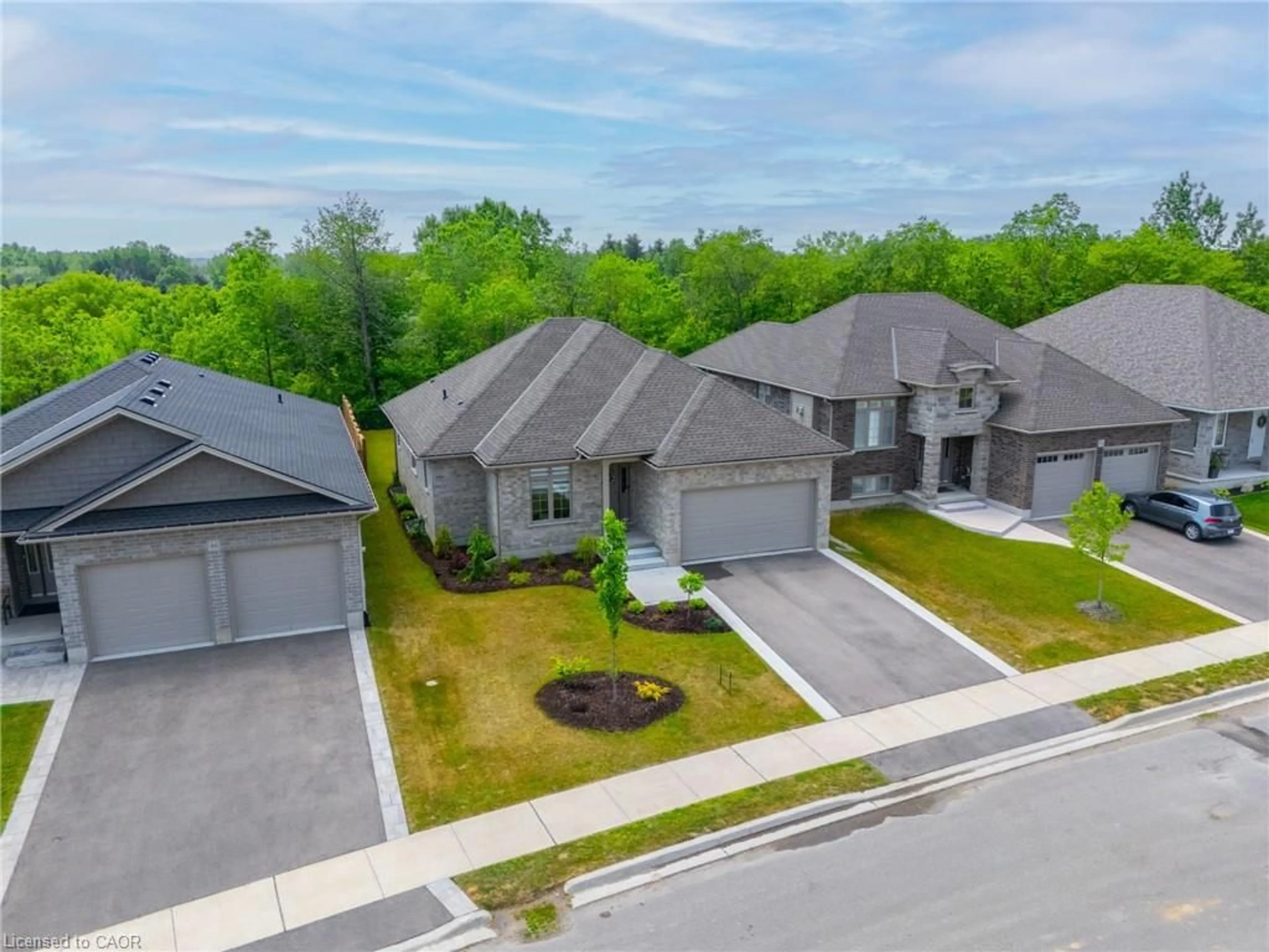 A pic from outside/outdoor area/front of a property/back of a property/a pic from drone, street for 50 Vanrooy Trail, Waterford Ontario N0E 1Y0