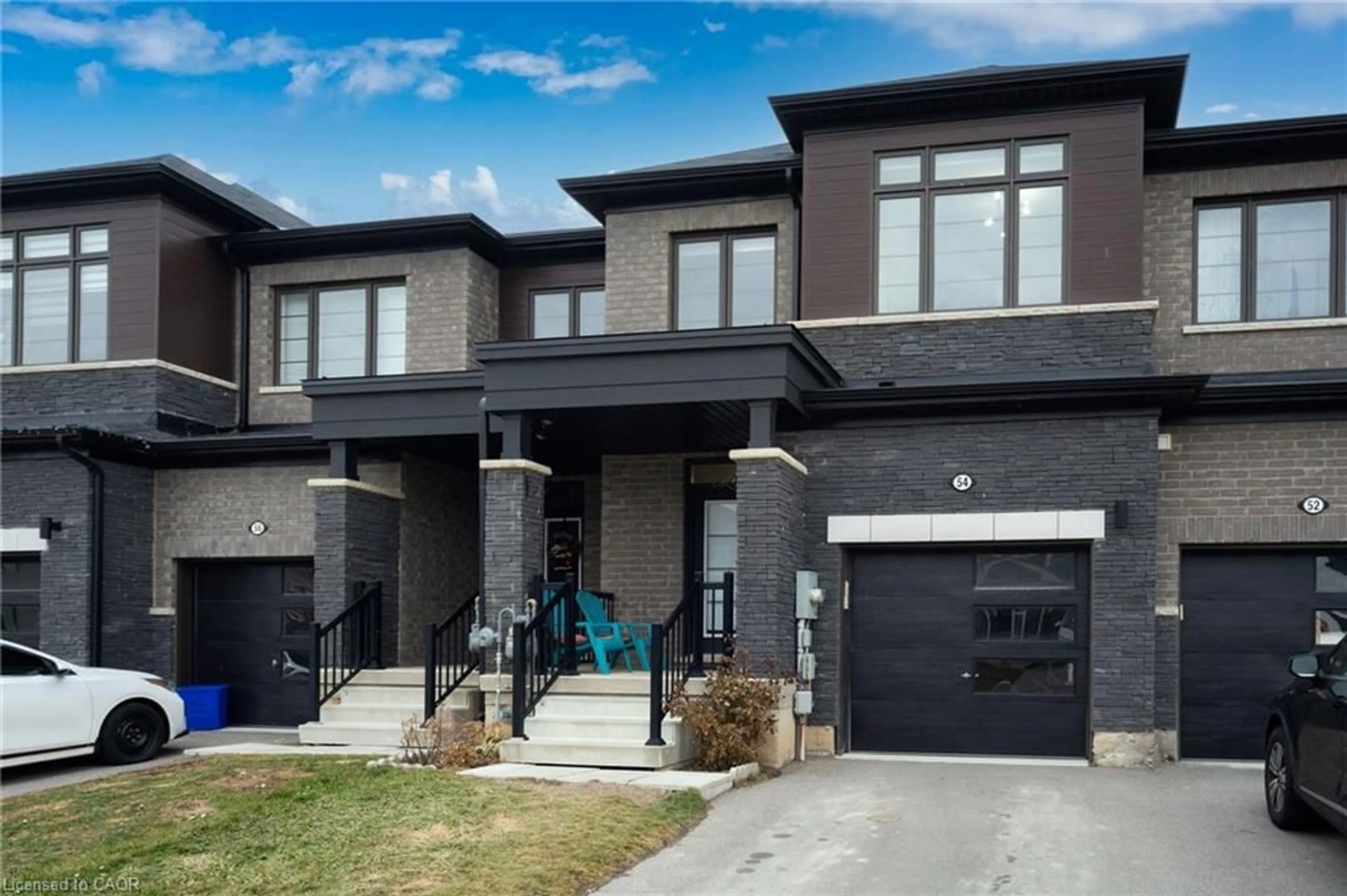Home with brick exterior material, street for 54 Oaktree Dr, Caledonia Ontario N3W 0E7