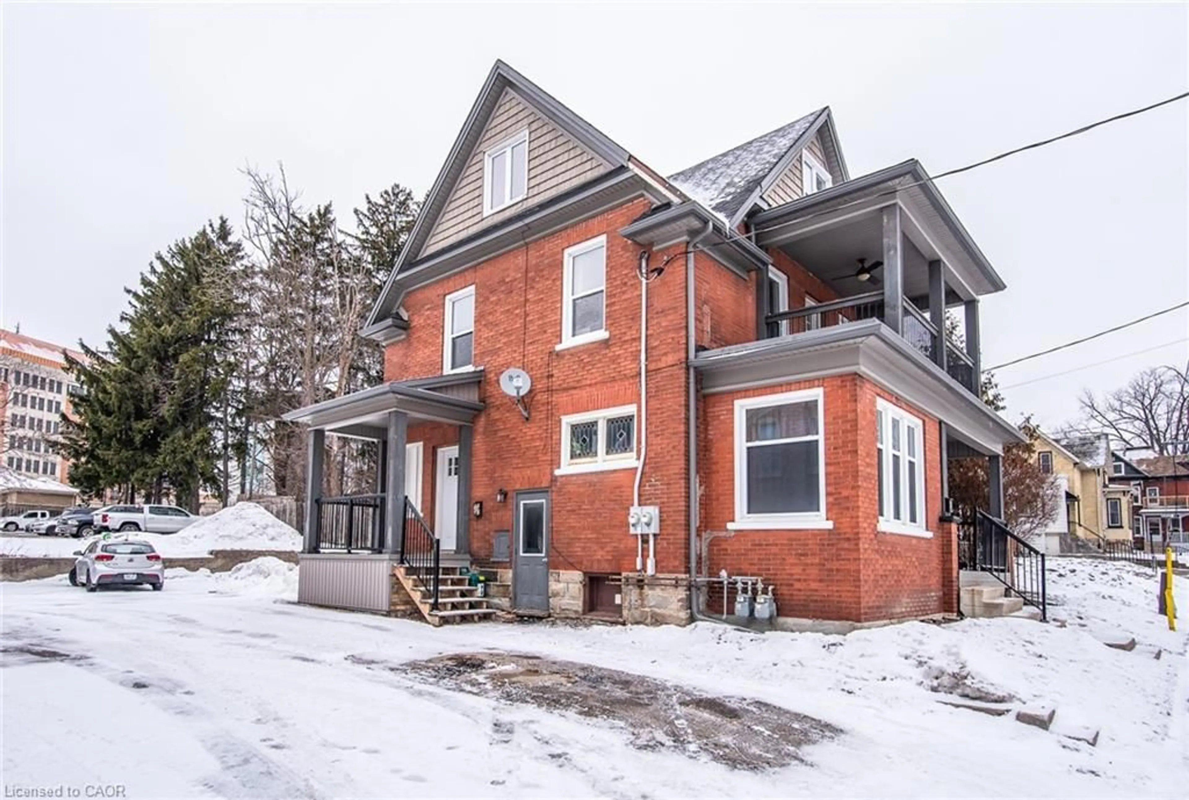 Home with brick exterior material, street for 94 Scott St, Kitchener Ontario N2H 2R5