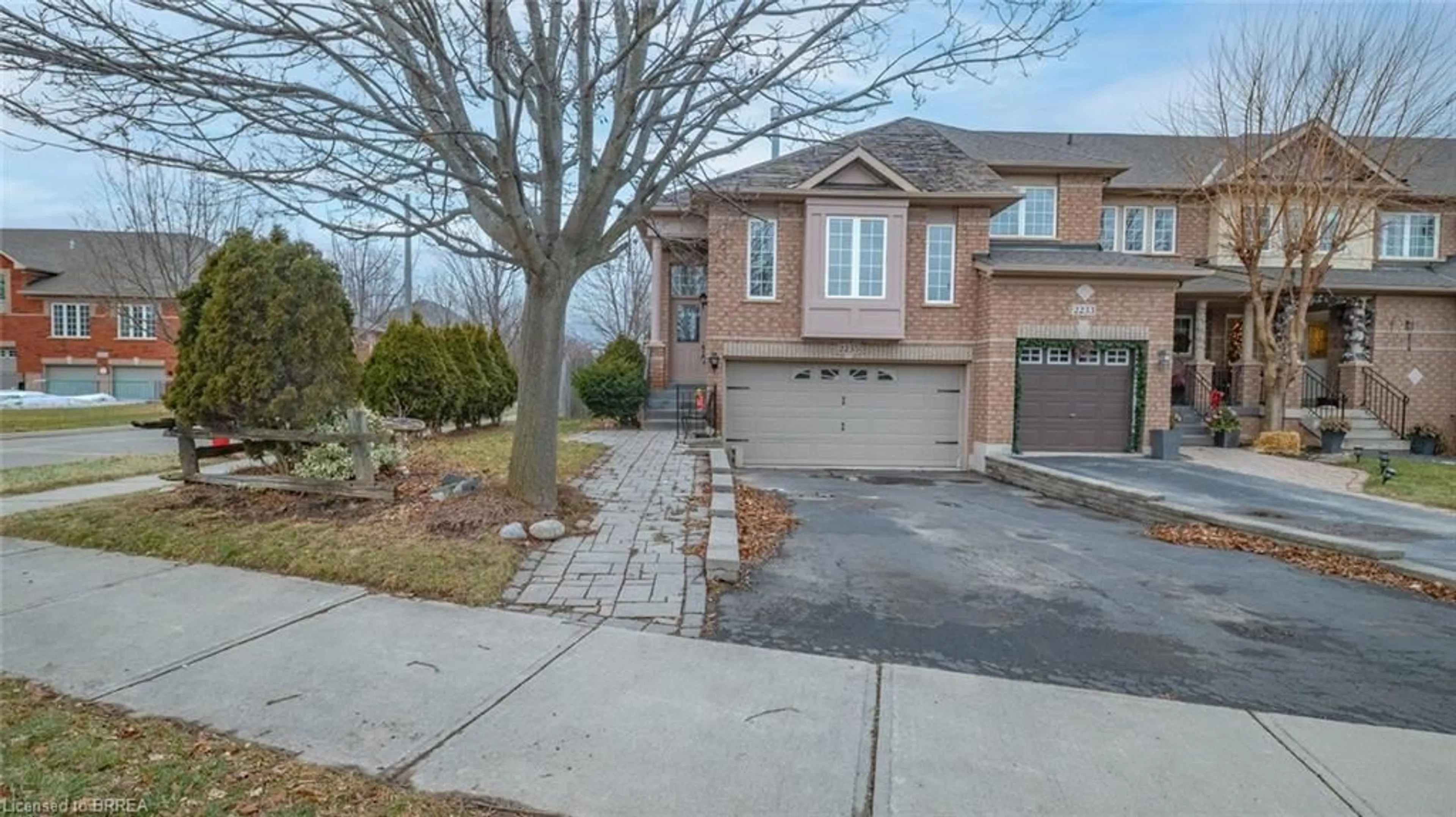 Home with brick exterior material, street for 2235 Hummingbird Way, Oakville Ontario L6M 3Z6