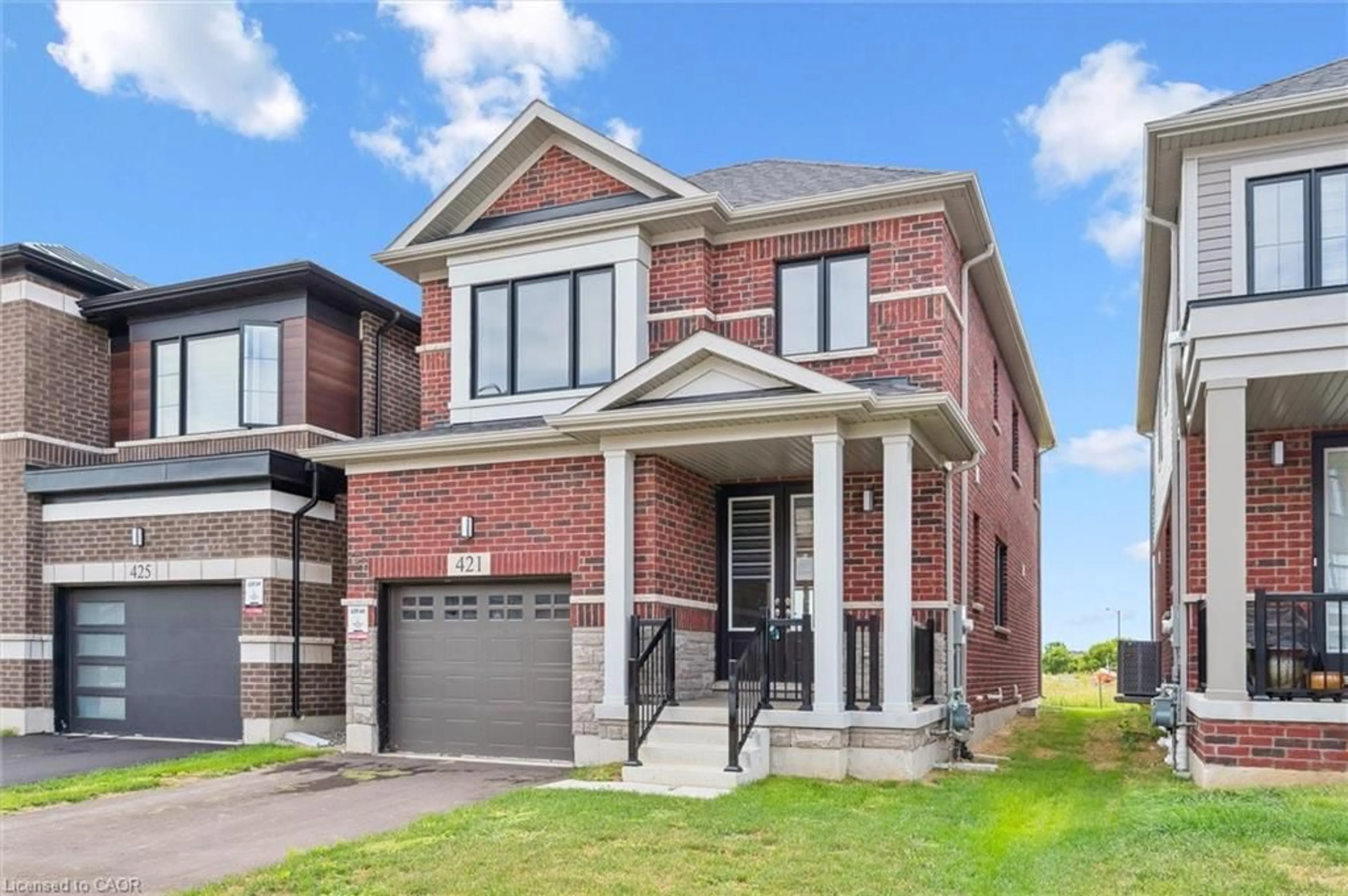 Home with brick exterior material, street for 421 Newman Dr, Cambridge Ontario N1S 0E1