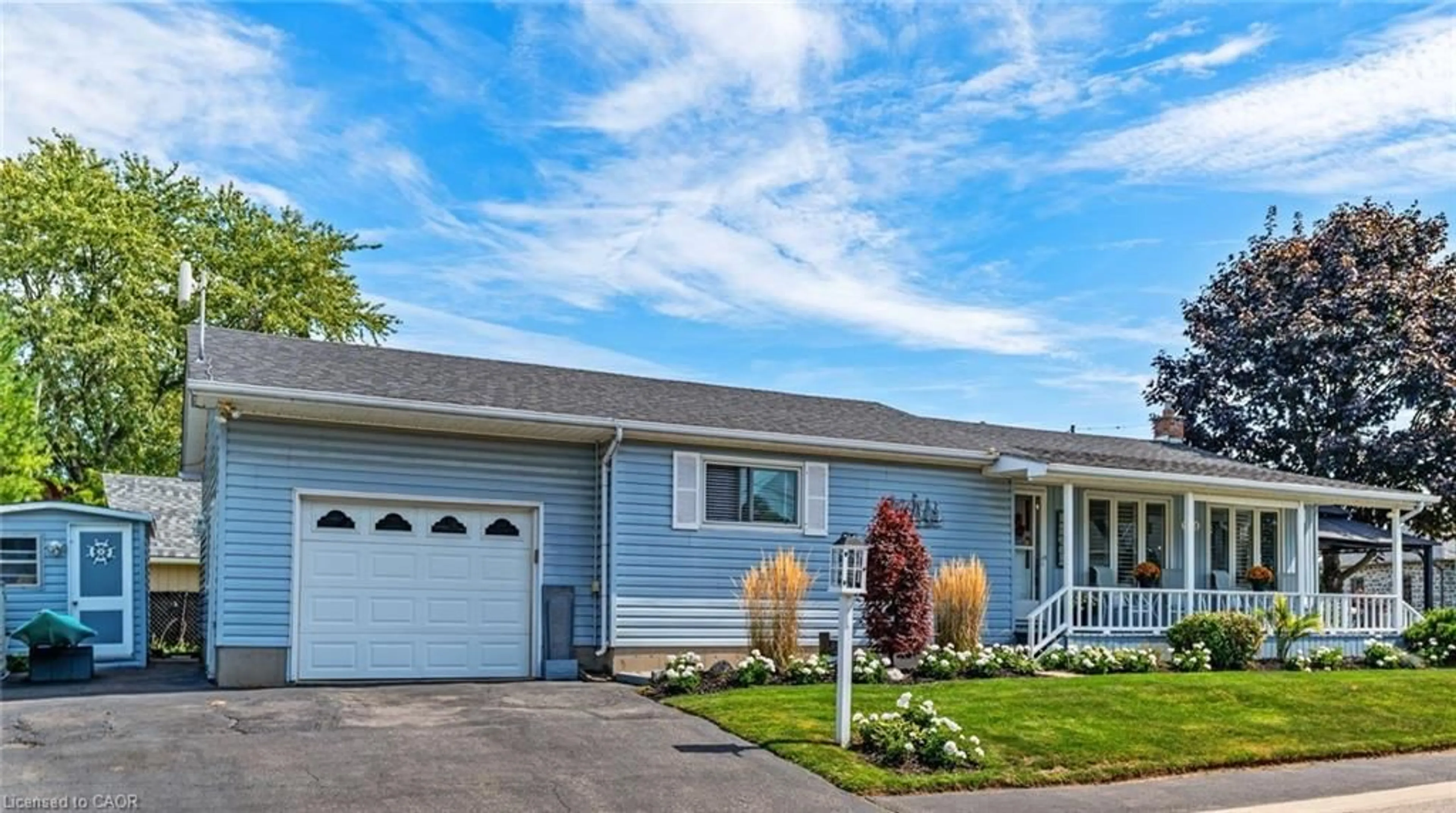 Home with vinyl exterior material, street for 2031 Erie St, Port Dover Ontario N0A 1N7