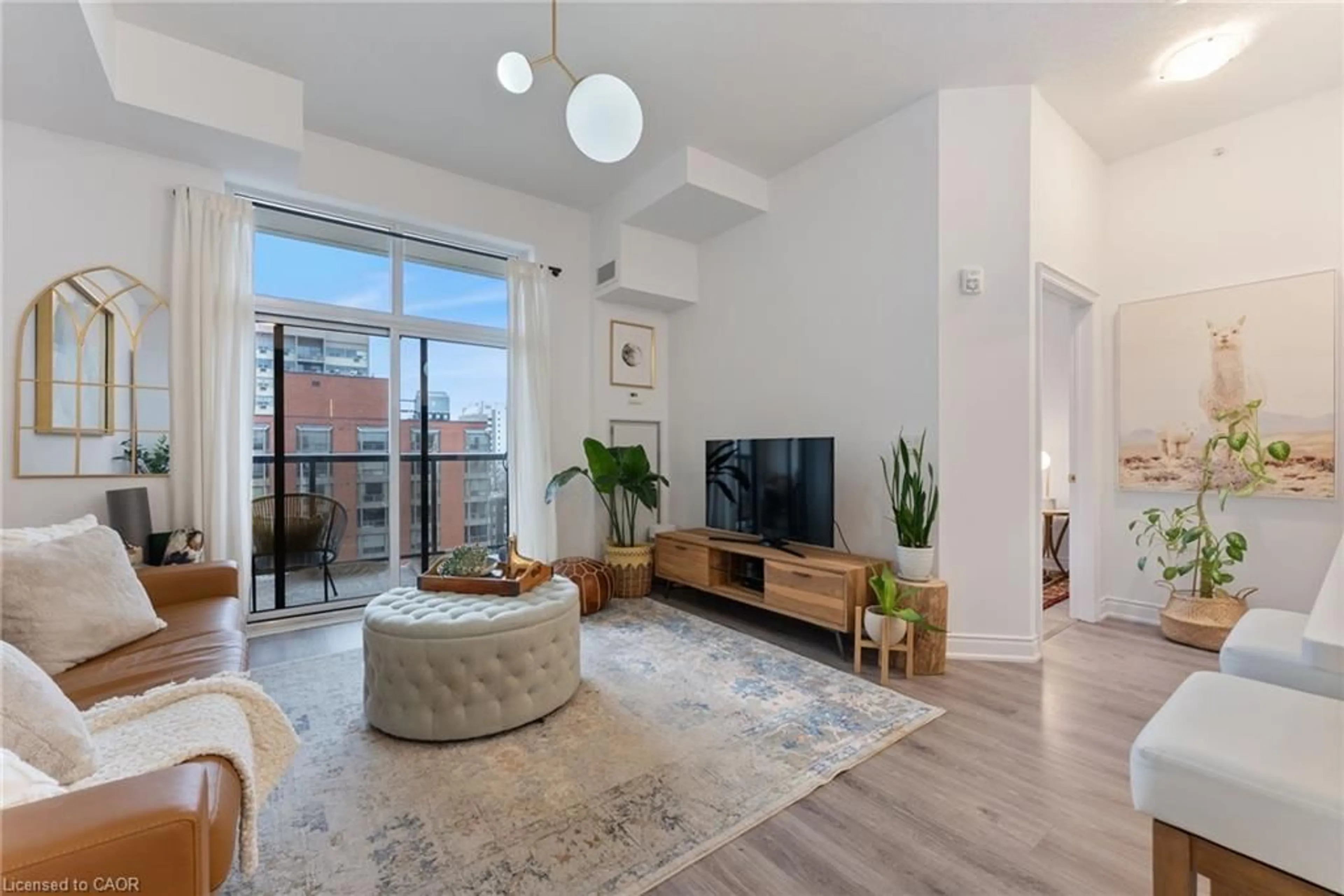 Living room with furniture, unknown for 81 Robinson St #1008, Hamilton Ontario L8P 0C2