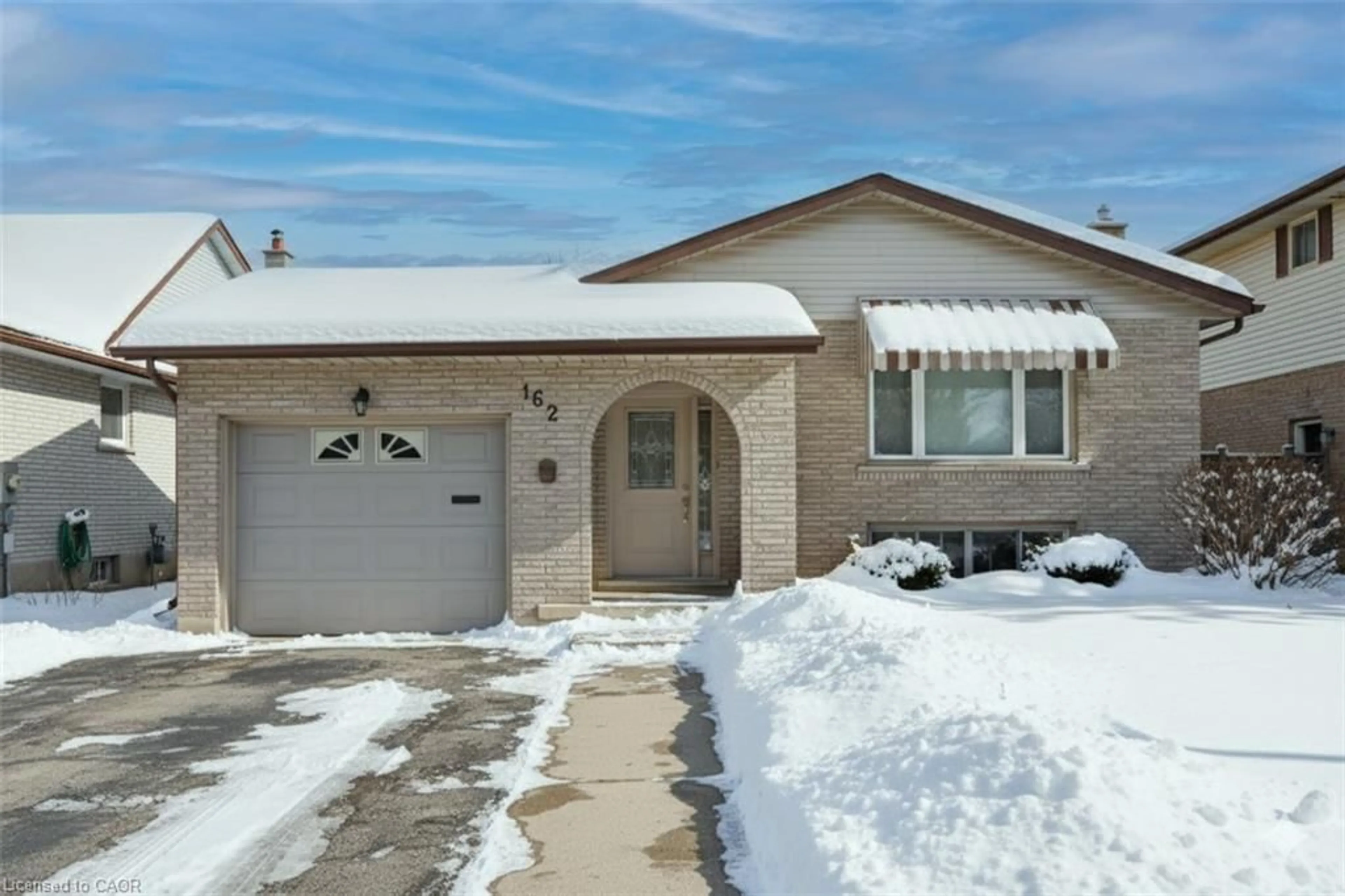 Home with brick exterior material, street for 162 The Country Way, Kitchener Ontario N2E 2L2