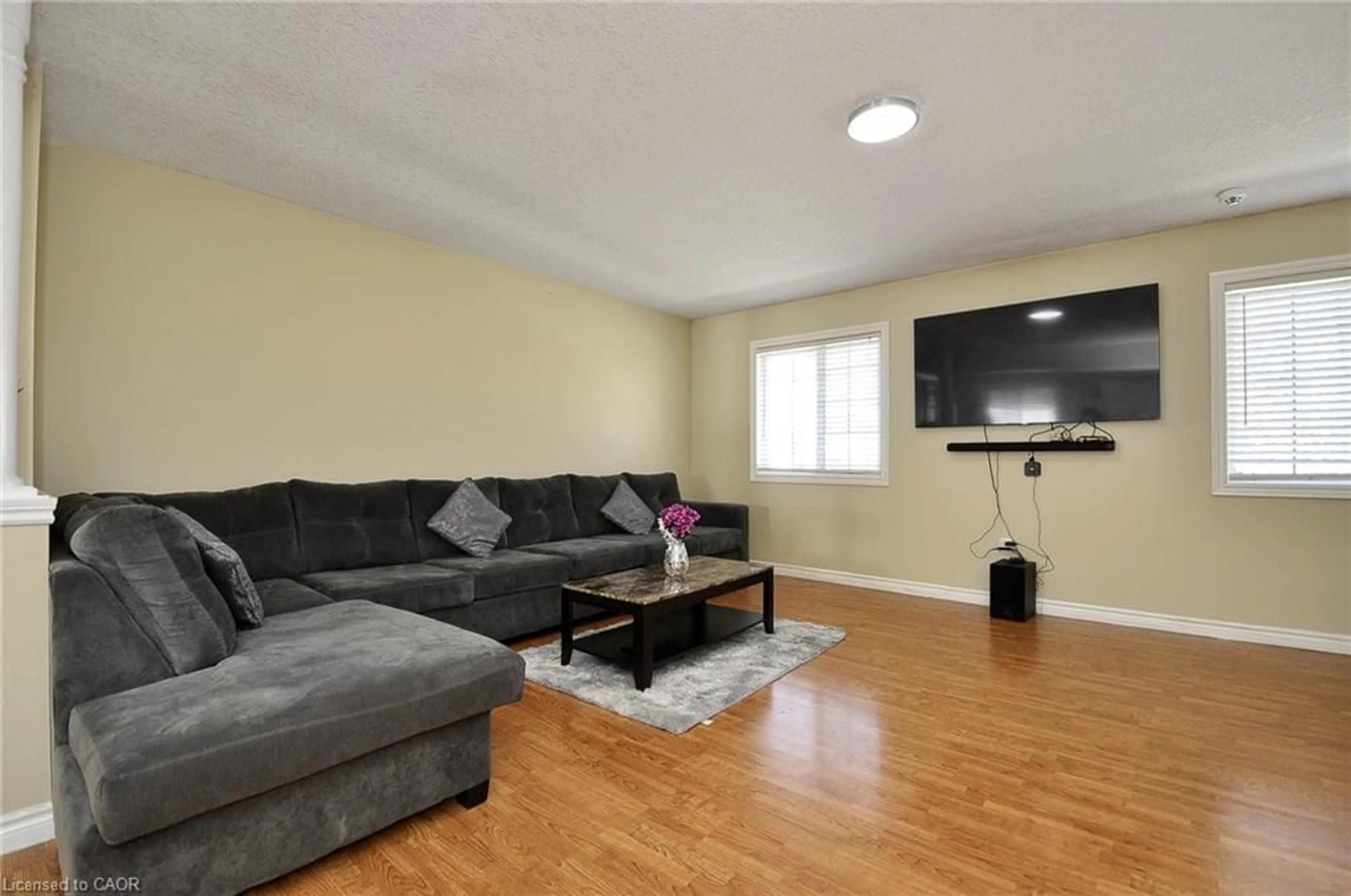 Living room with furniture, wood/laminate floor for 45 Highgate Rd, Kitchener Ontario N2N 3P5