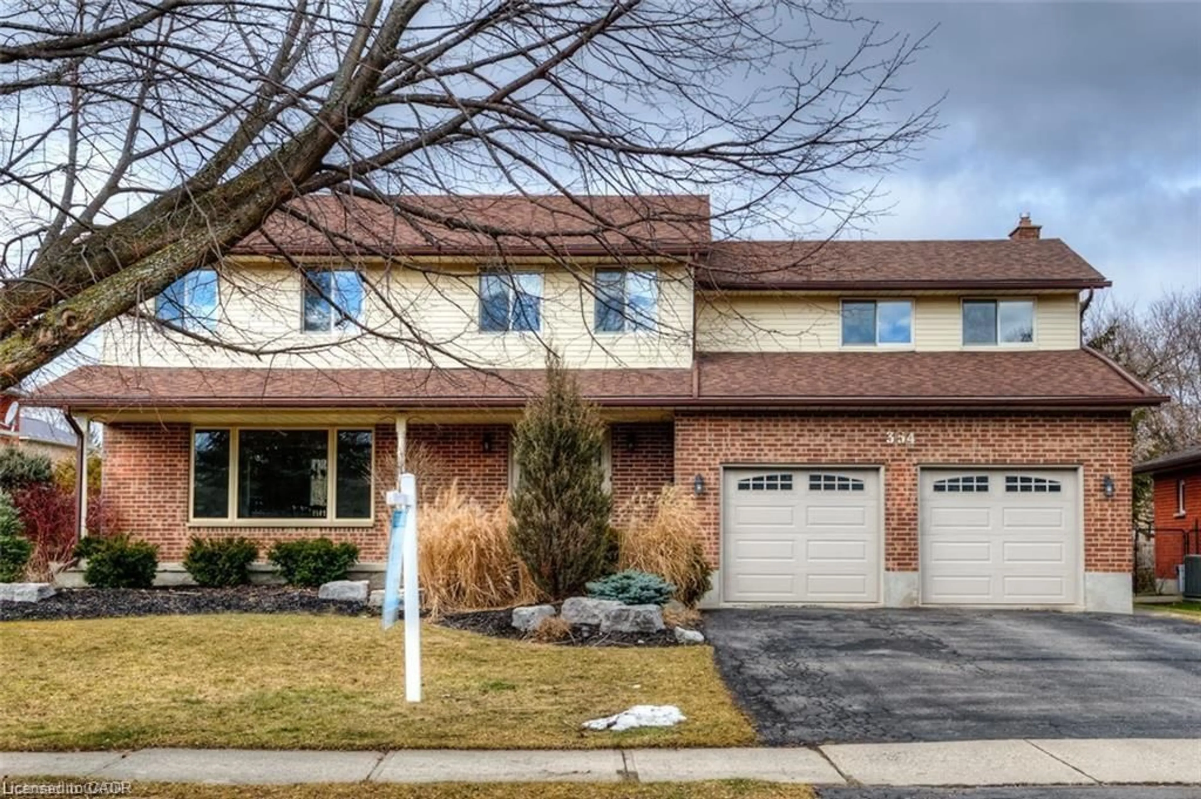 Home with brick exterior material, street for 354 Forestlawn Rd, Waterloo Ontario N2K 3A5