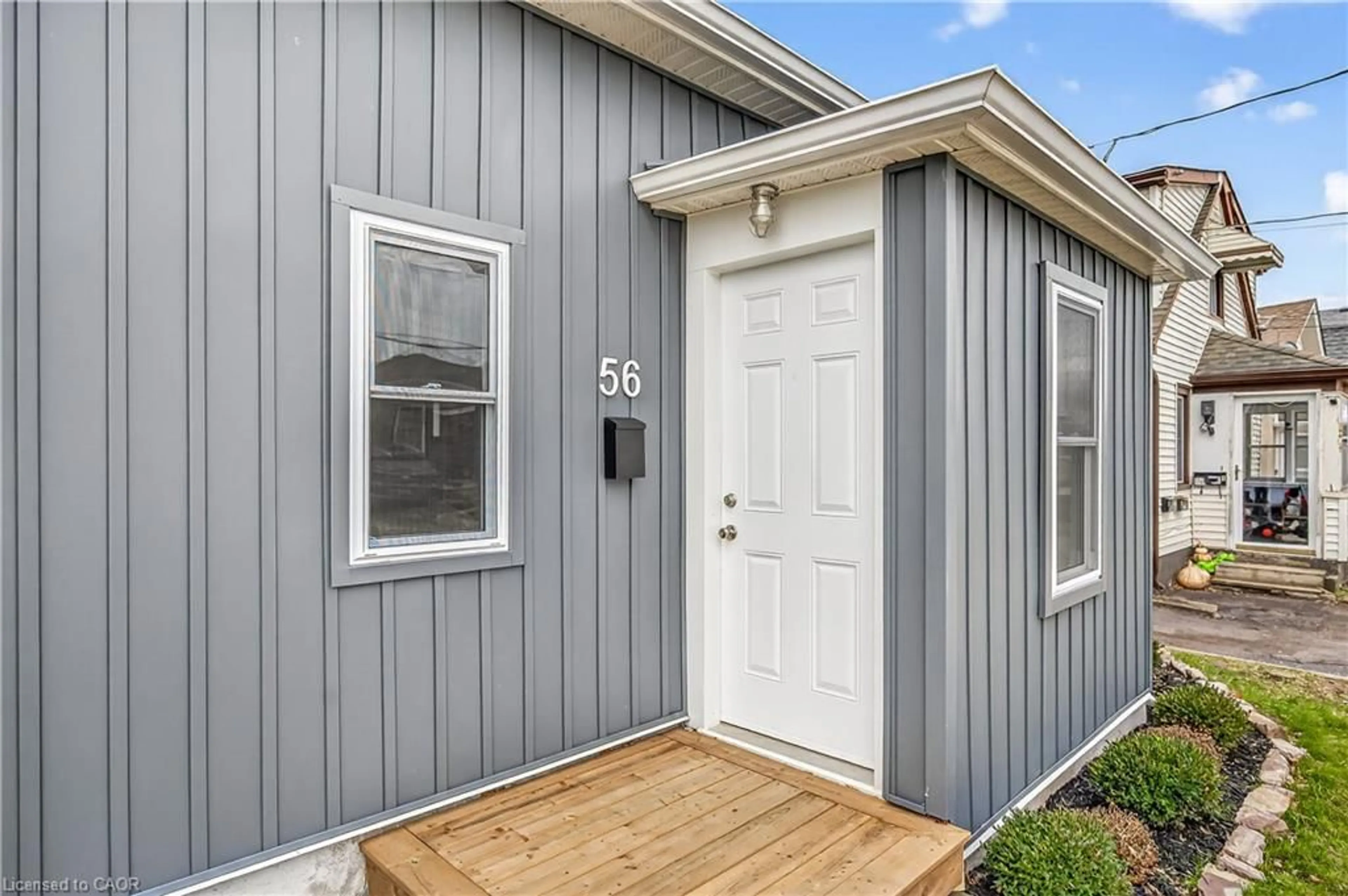 Home with vinyl exterior material, street for 56 Division St, St. Catharines Ontario L2R 3G5