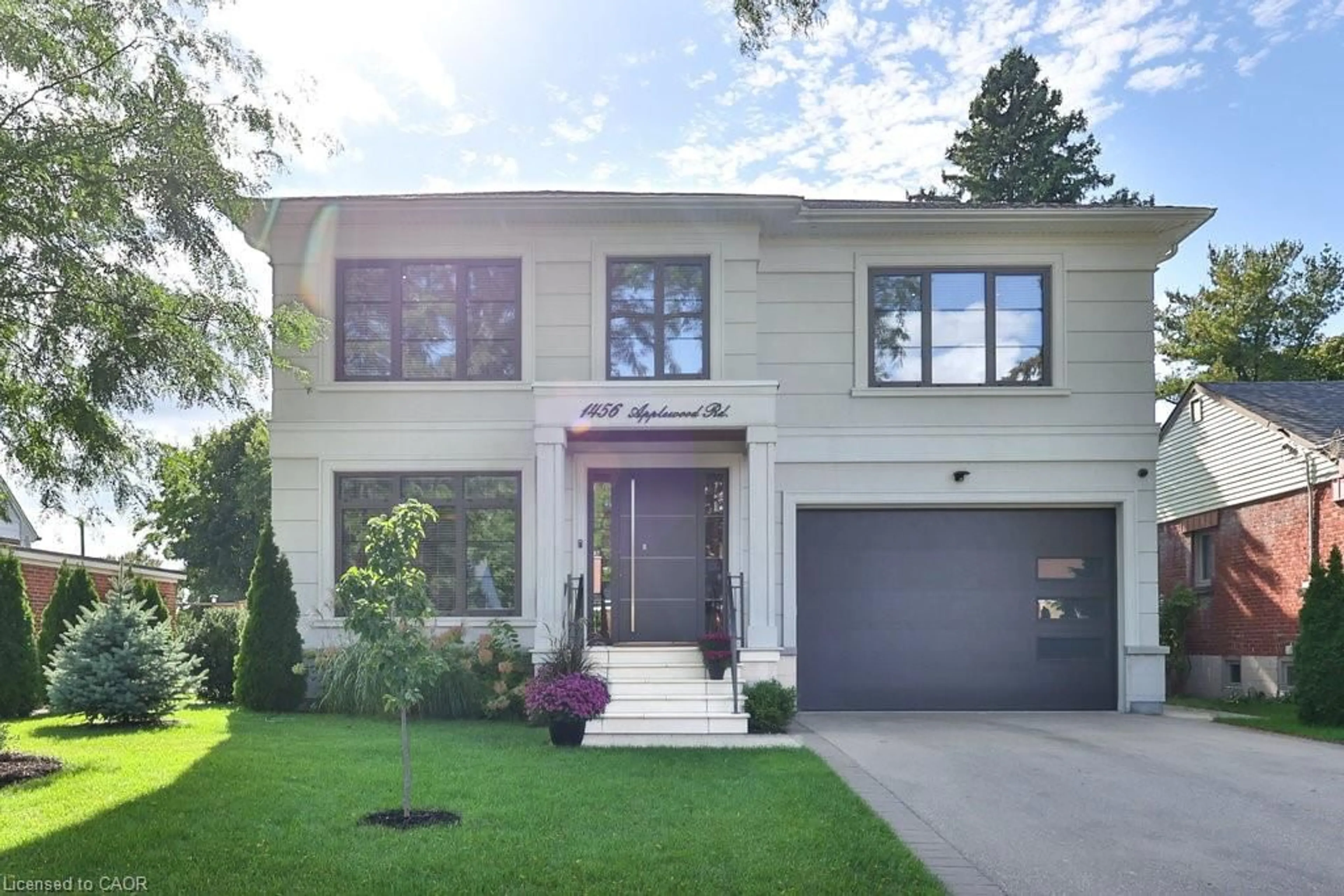 Home with brick exterior material, street for 1456 Applewood Rd, Mississauga Ontario L5E 2M1