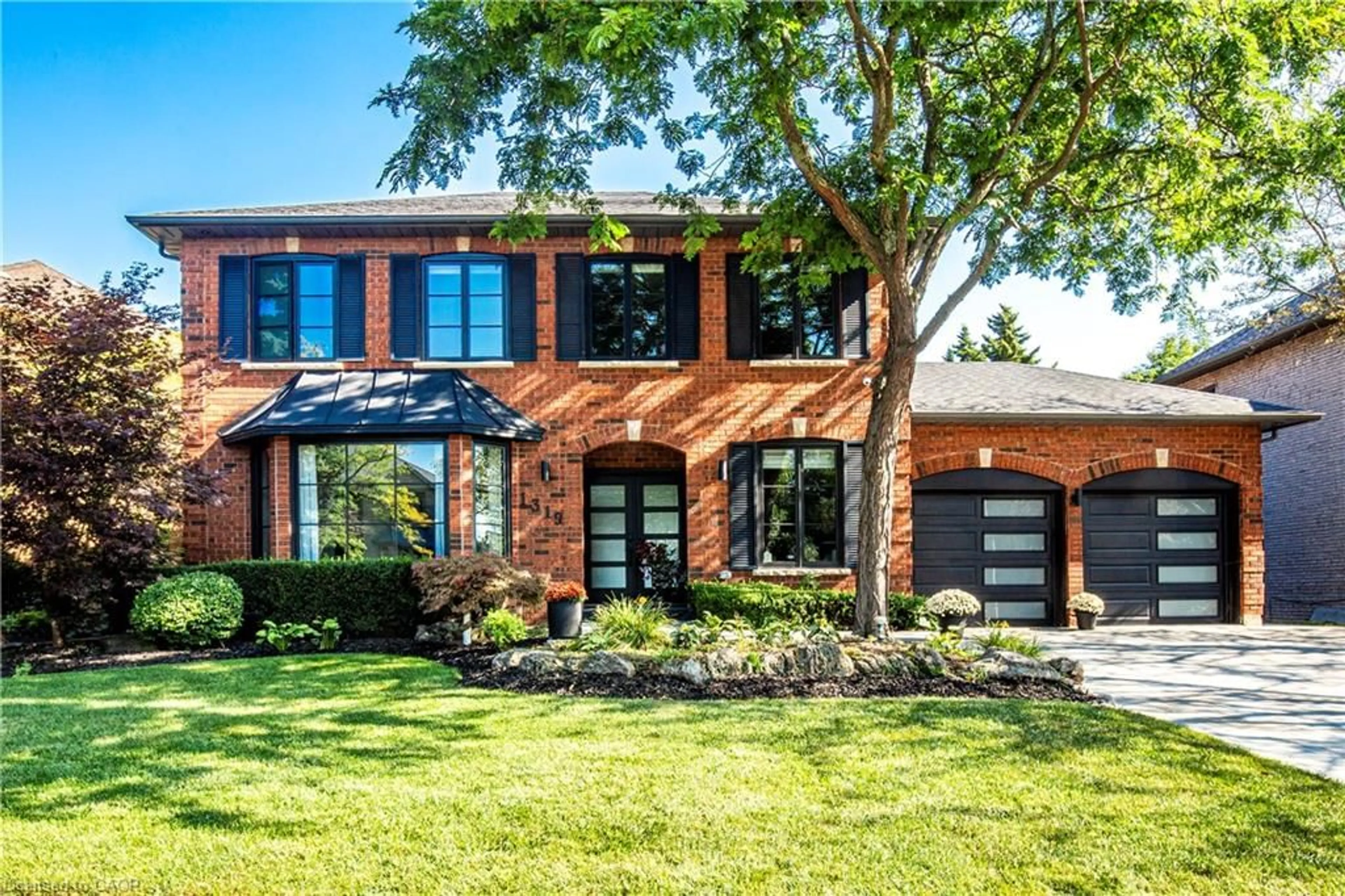 Home with brick exterior material, street for 1319 Greeneagle Dr, Oakville Ontario L6M 2N1