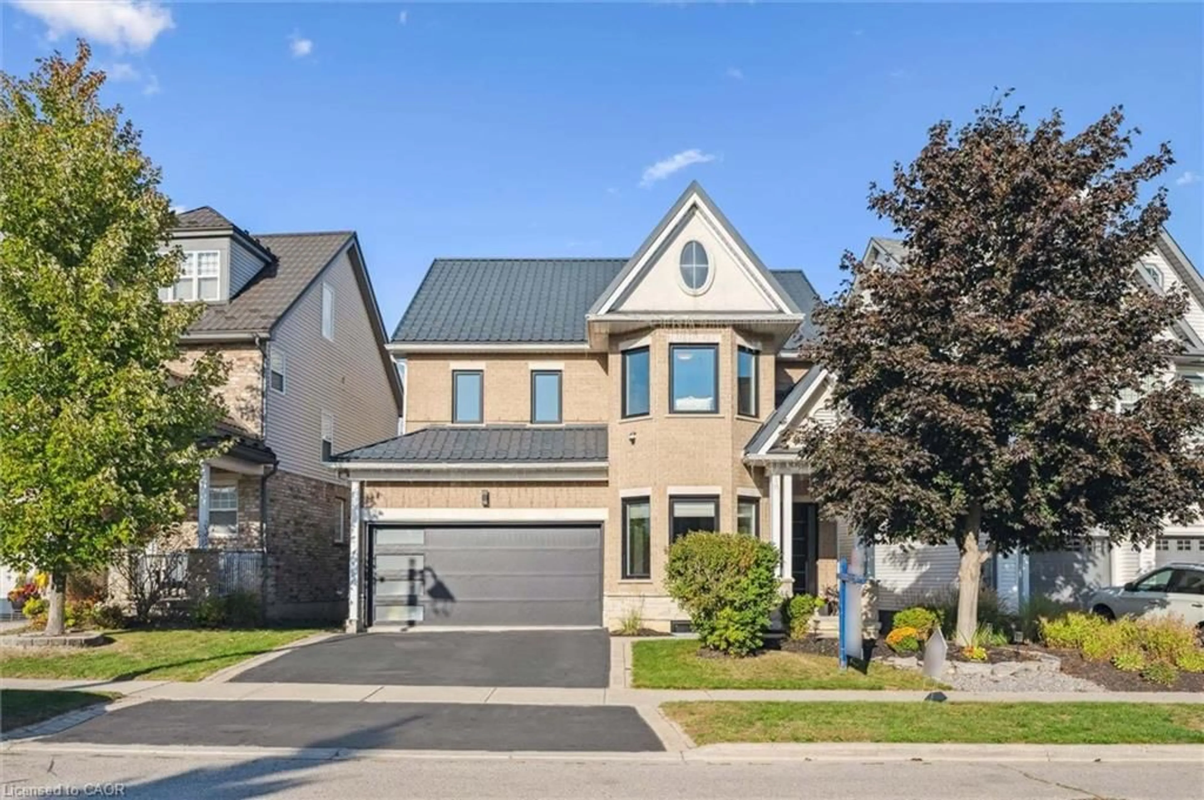 Home with brick exterior material, street for 244 Carrington Dr, Guelph Ontario N1G 5K2