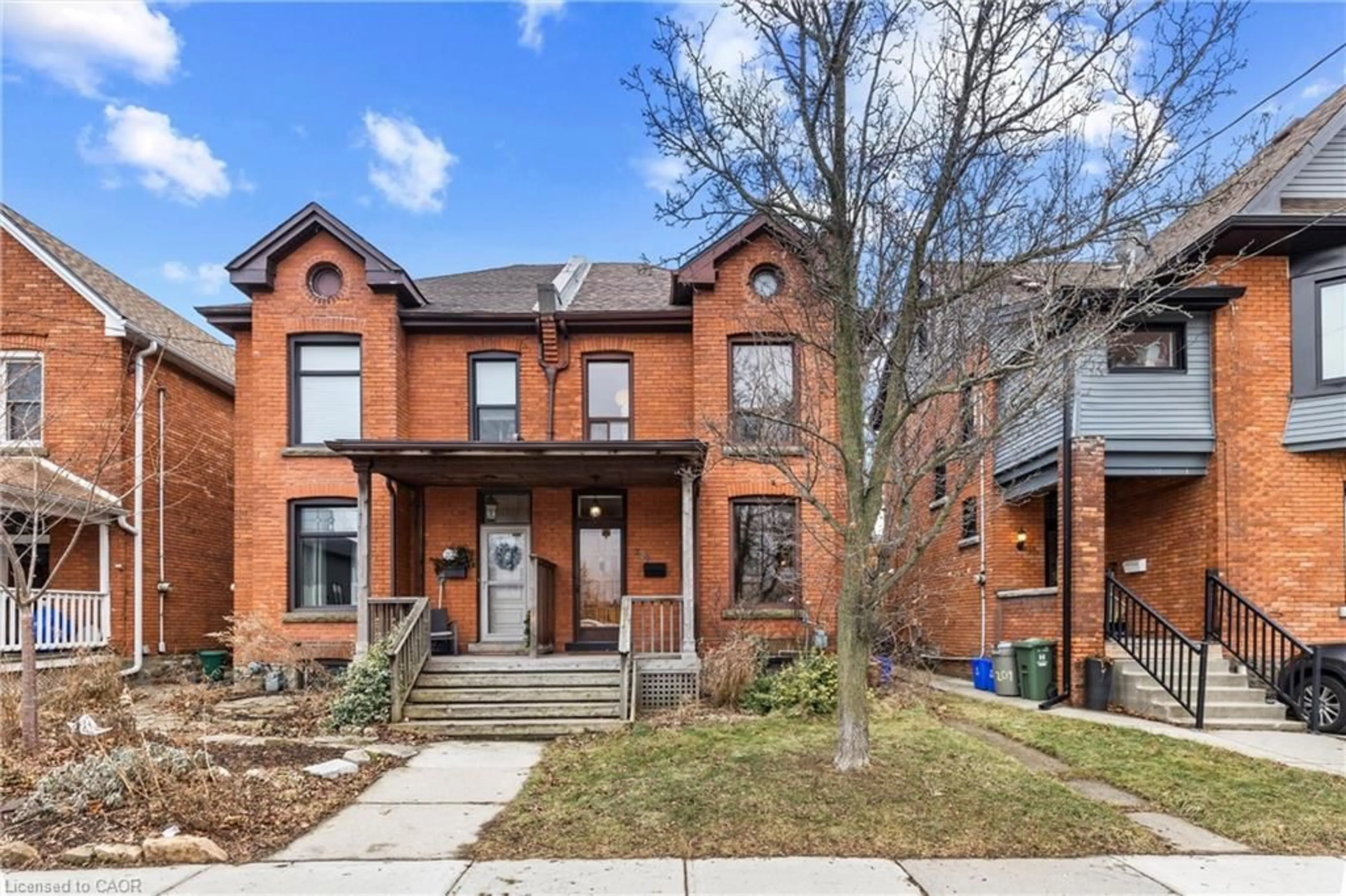 Home with brick exterior material, street for 207 Stanley Ave, Hamilton Ontario L8P 2L5