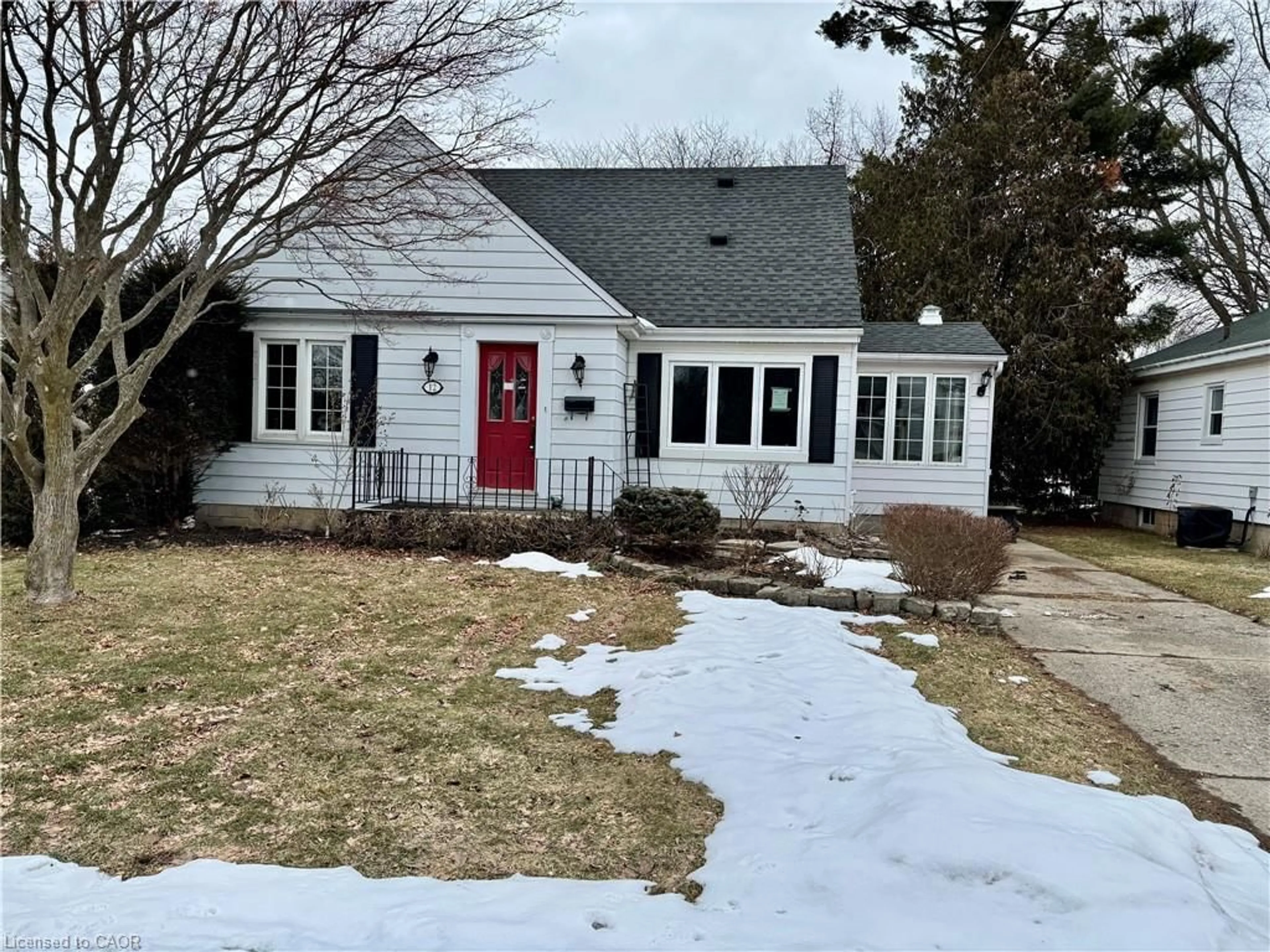 Home with vinyl exterior material, street for 12 Spruce St, St. Thomas Ontario N5R 1N5