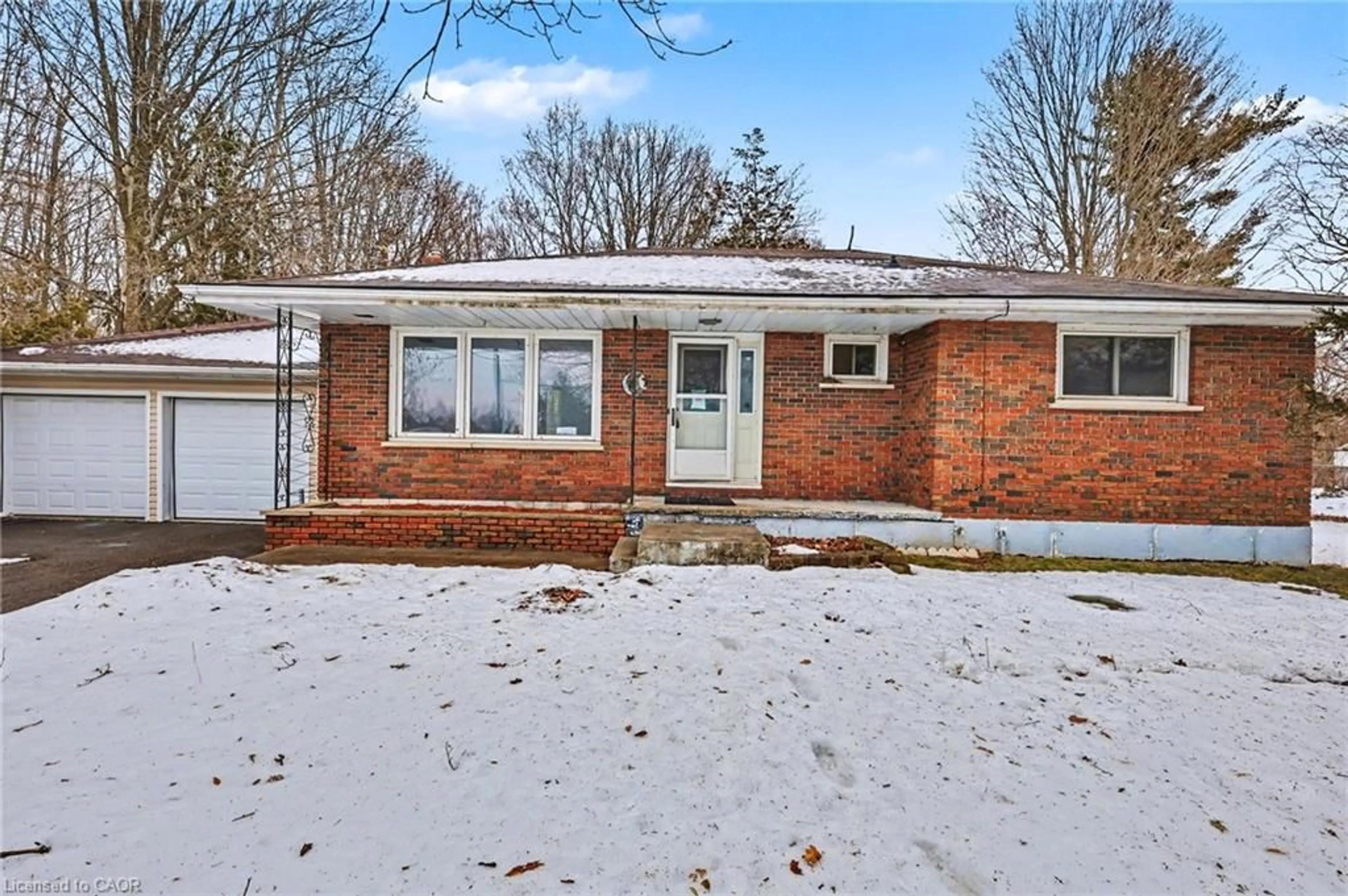 Home with brick exterior material, street for 606 Glen Miller Rd, Trenton Ontario K8V 0B5
