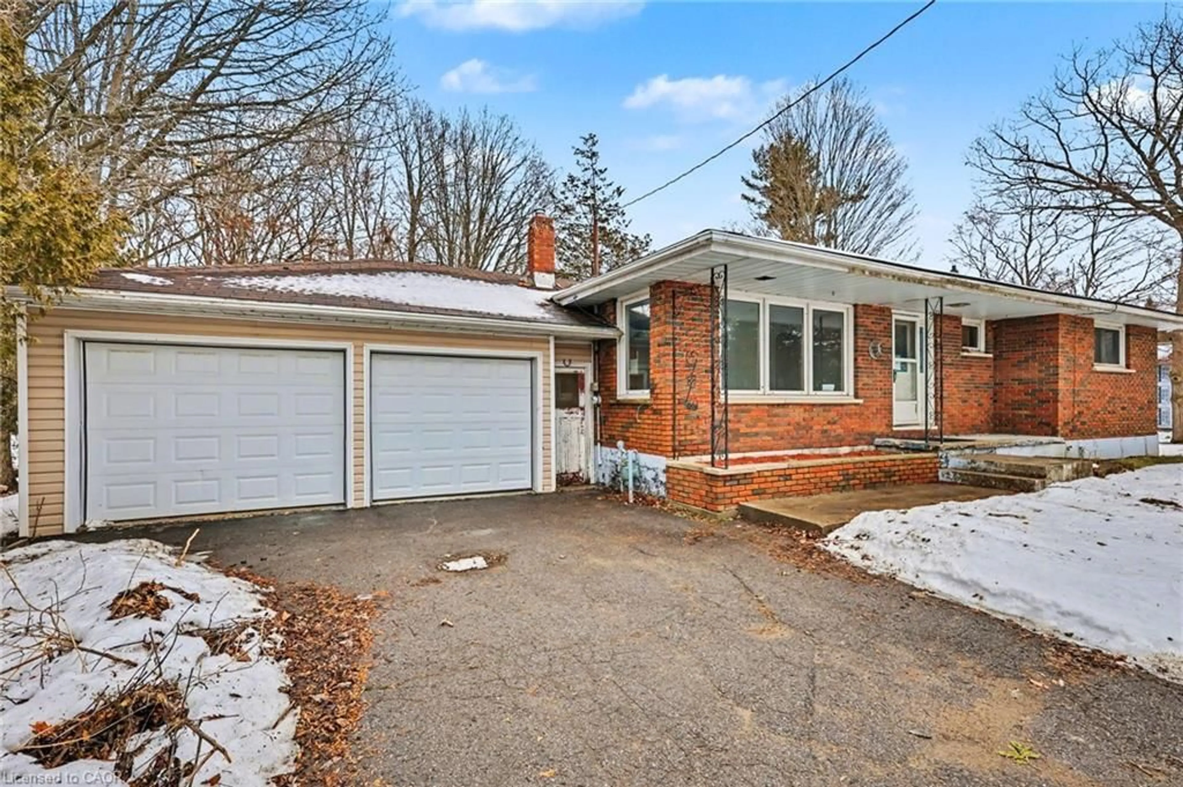 Home with brick exterior material, street for 606 Glen Miller Rd, Trenton Ontario K8V 0B5