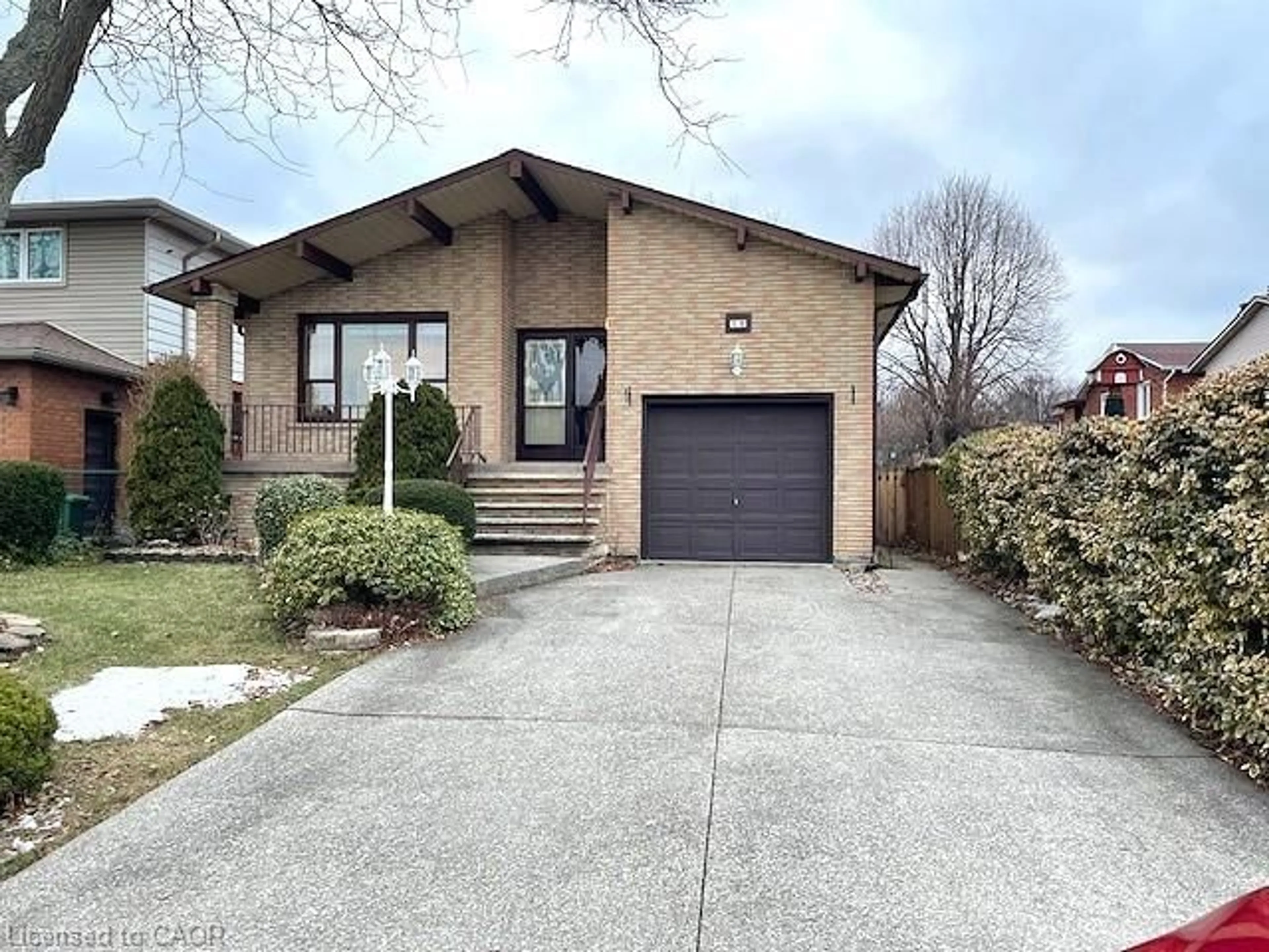 Home with brick exterior material, street for 18 Kingfisher Dr, Hamilton Ontario L9A 5A4