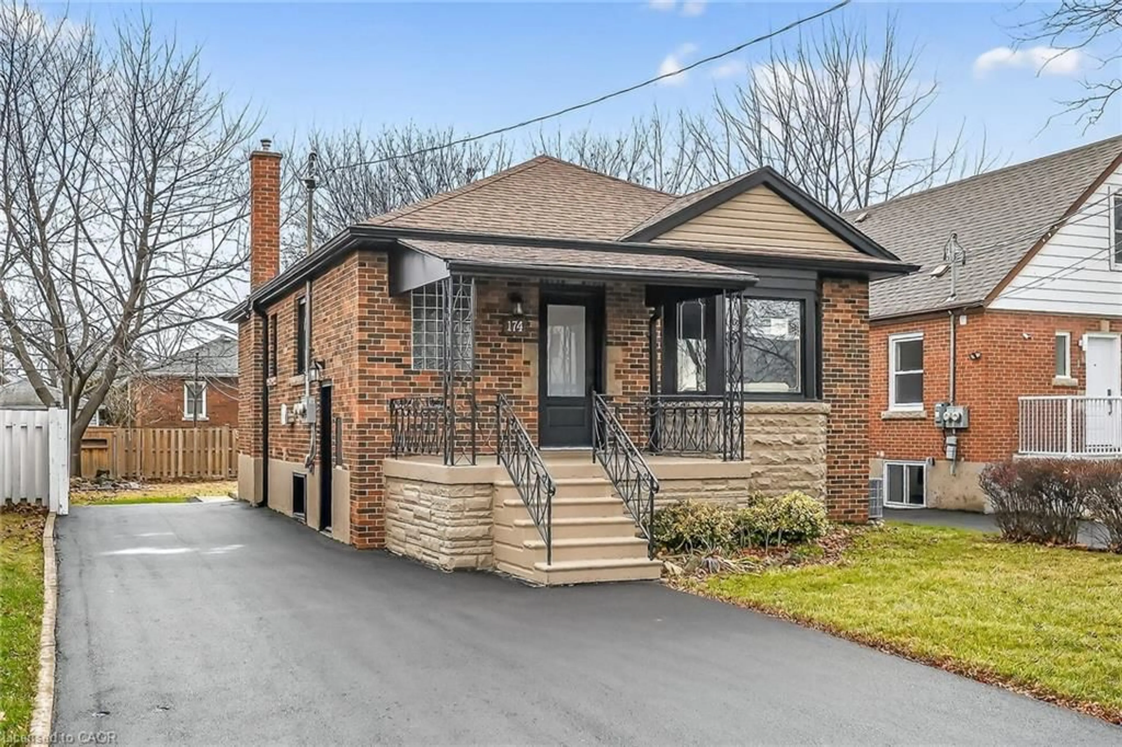 Home with brick exterior material, street for 174 East 34th St, Hamilton Ontario L8V 3W6