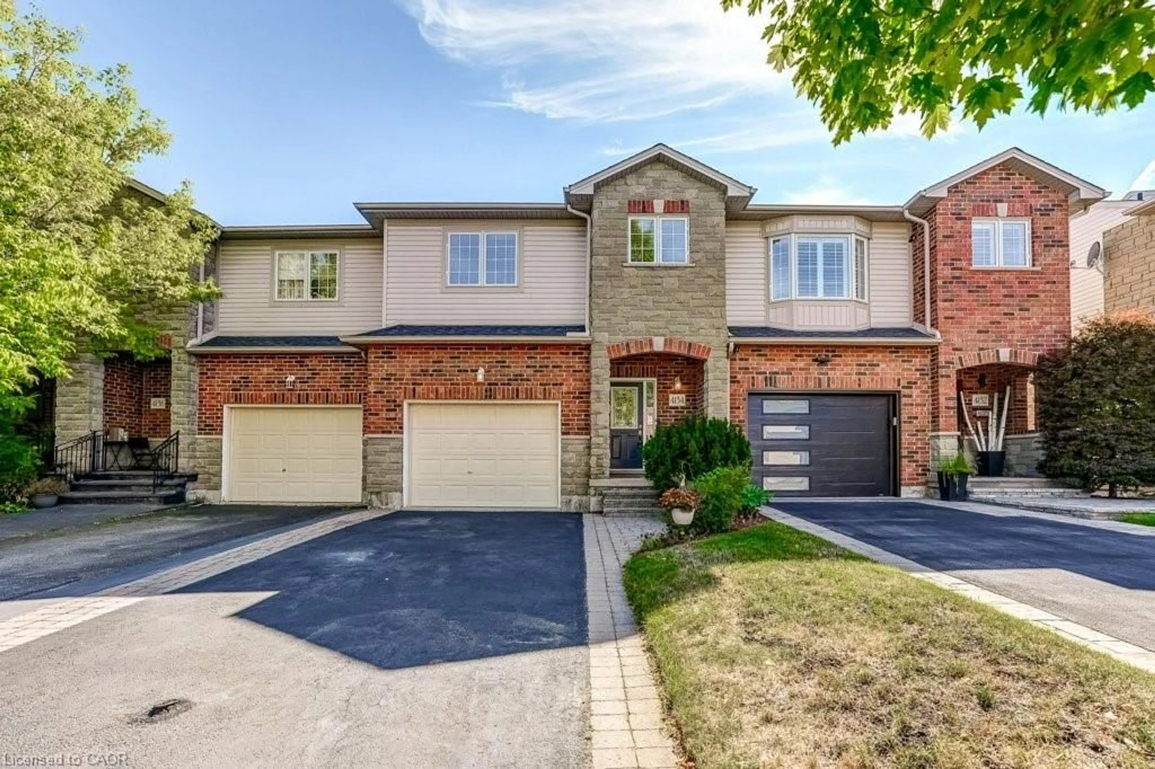 Home with brick exterior material, street for 4134 Medland Dr, Burlington Ontario L7M 4Z8
