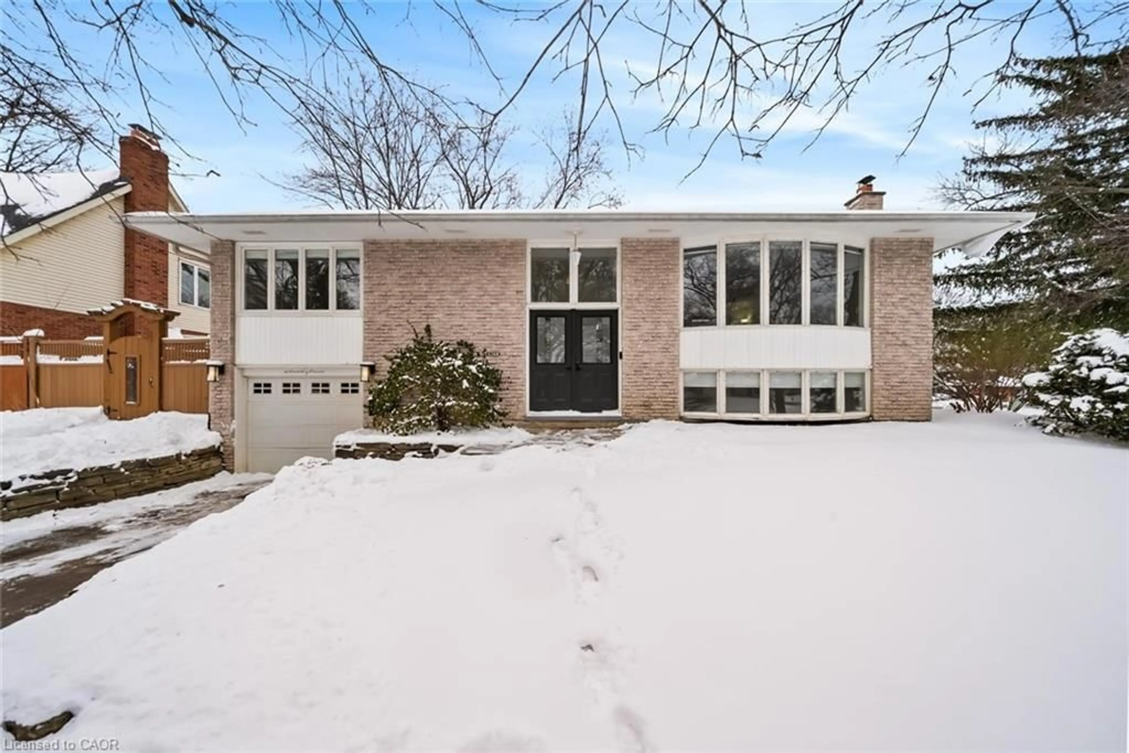 Home with brick exterior material, street for 407 Canterbury Cres, Oakville Ontario L6J 5K8