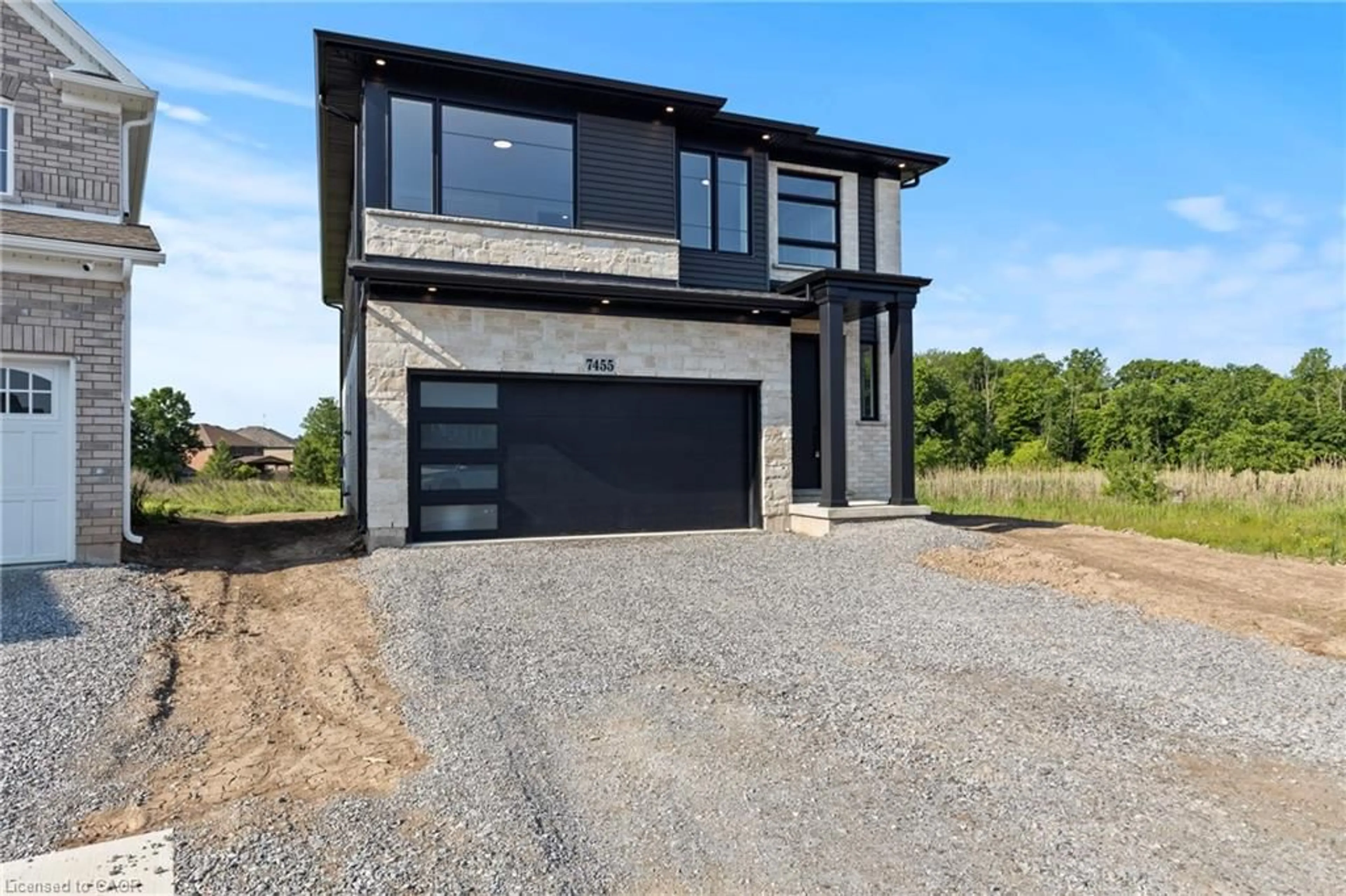 Home with brick exterior material, street for 7455 Majestic Trail, Niagara Falls Ontario L2H 3V9