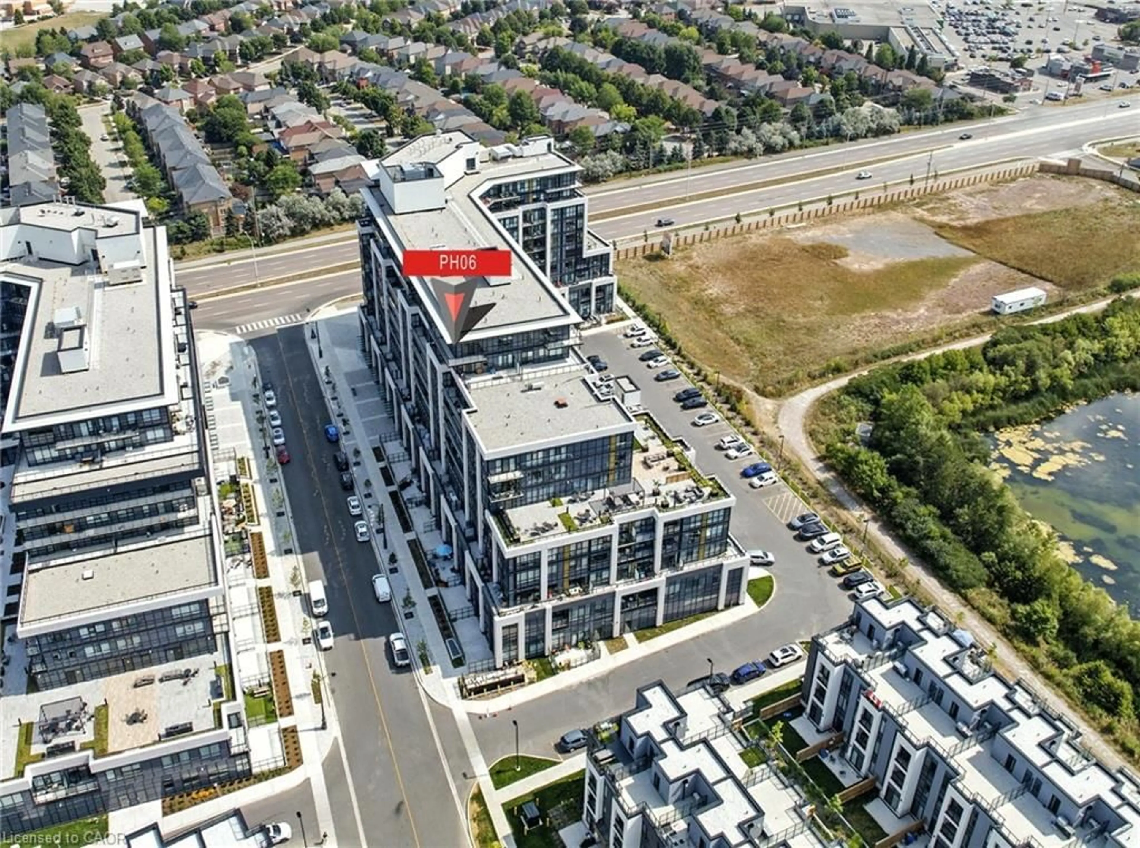 A pic from outside/outdoor area/front of a property/back of a property/a pic from drone, building for 405 Dundas St #PH06, Oakville Ontario L6M 4M2