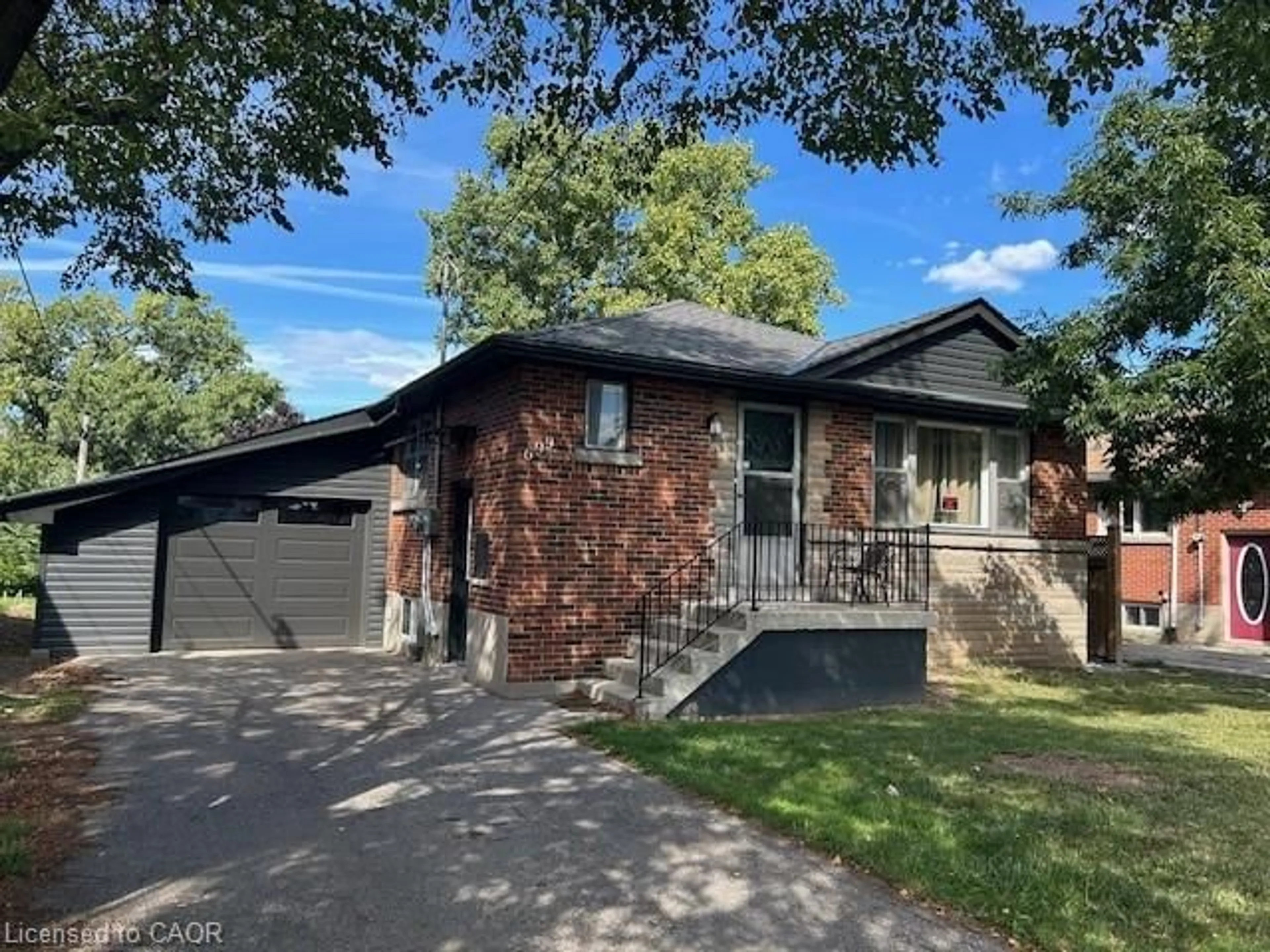 Home with brick exterior material, street for 699 Ninth Ave, Hamilton Ontario L8T 2A1