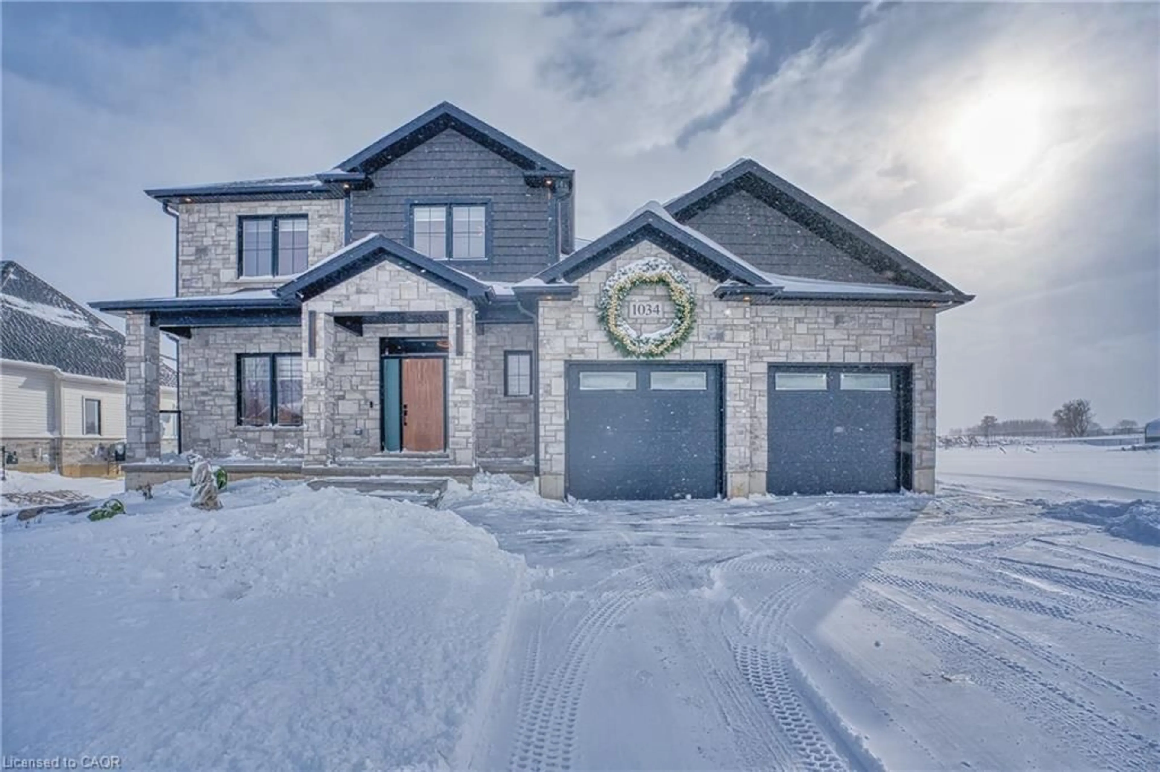 Home with brick exterior material, street for 1034 Walton Ave, Listowel Ontario N4W 3S2