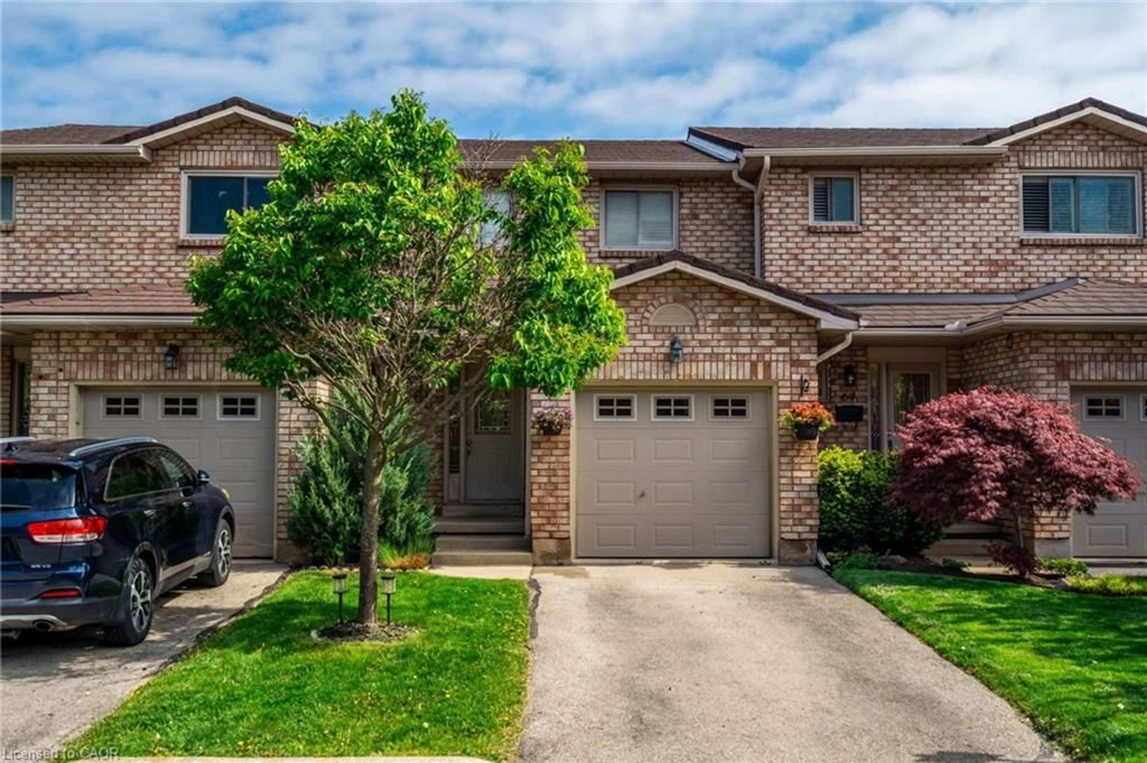 Home with brick exterior material, street for 391 Stone Church Rd #63, Hamilton Ontario L9B 2H3