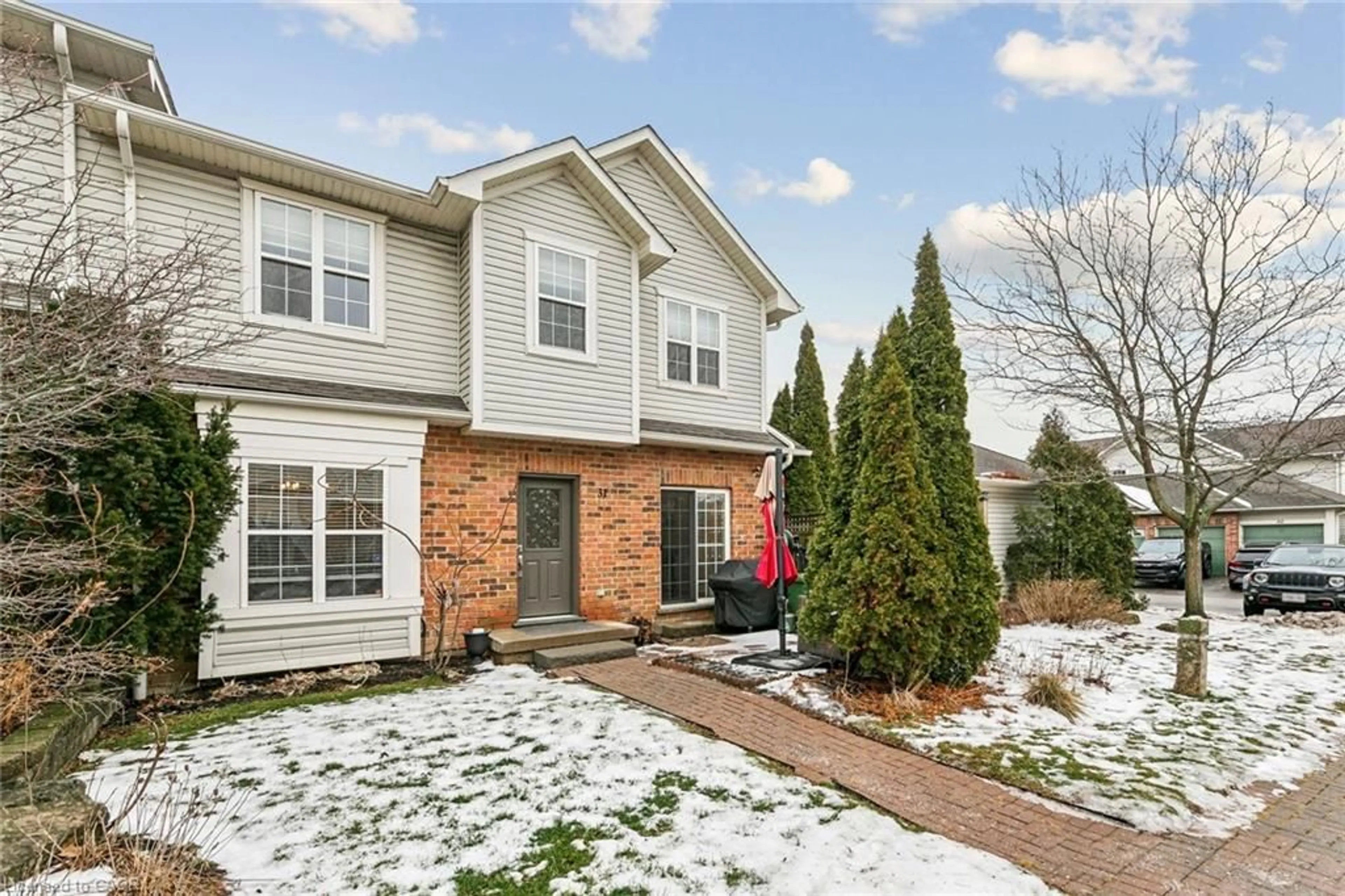 Home with brick exterior material, street for 1085 Harrogate Dr #31, Ancaster Ontario L9K 1R2