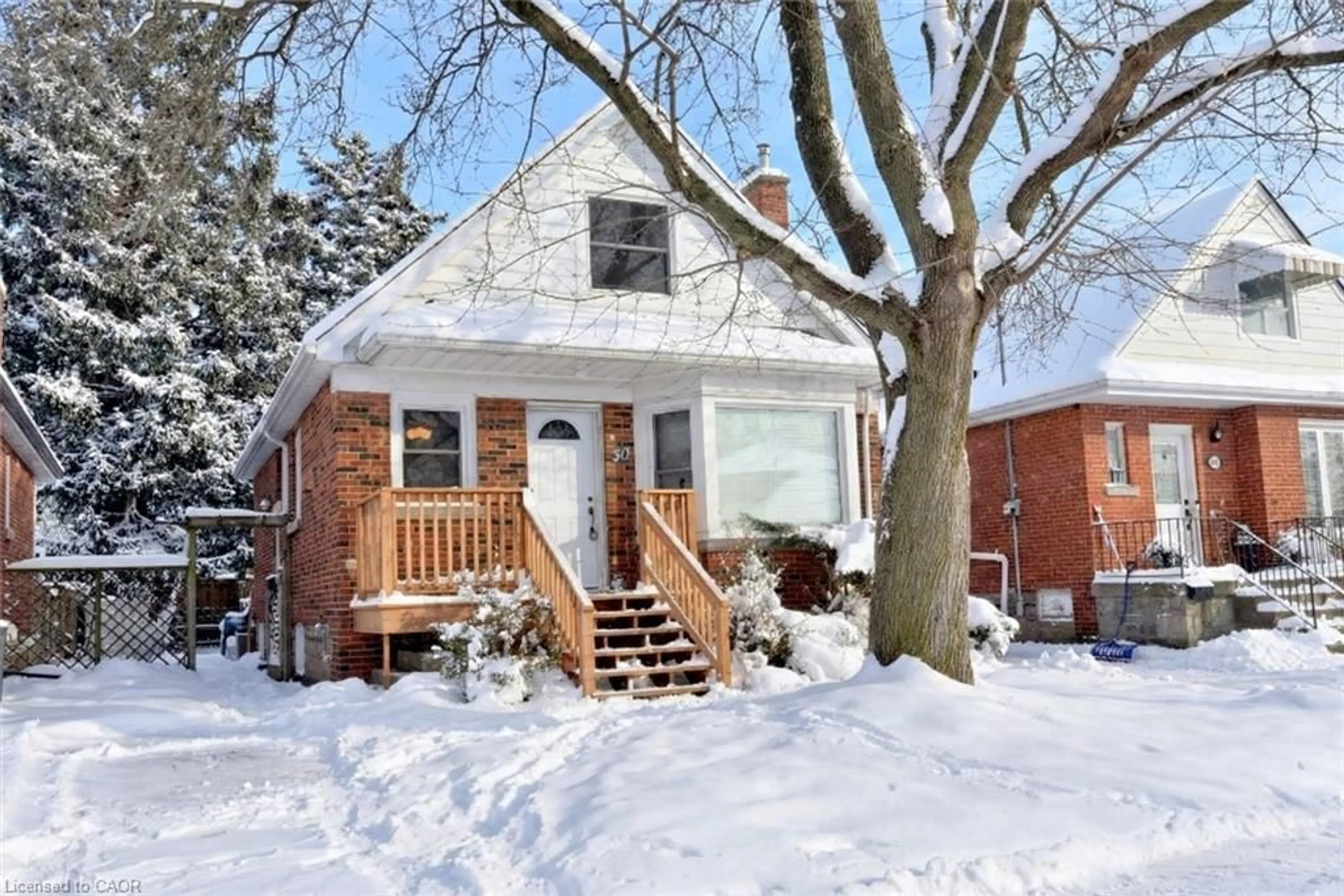 Home with brick exterior material, street for 36 Kipling Rd, Hamilton Ontario L8S 3X3