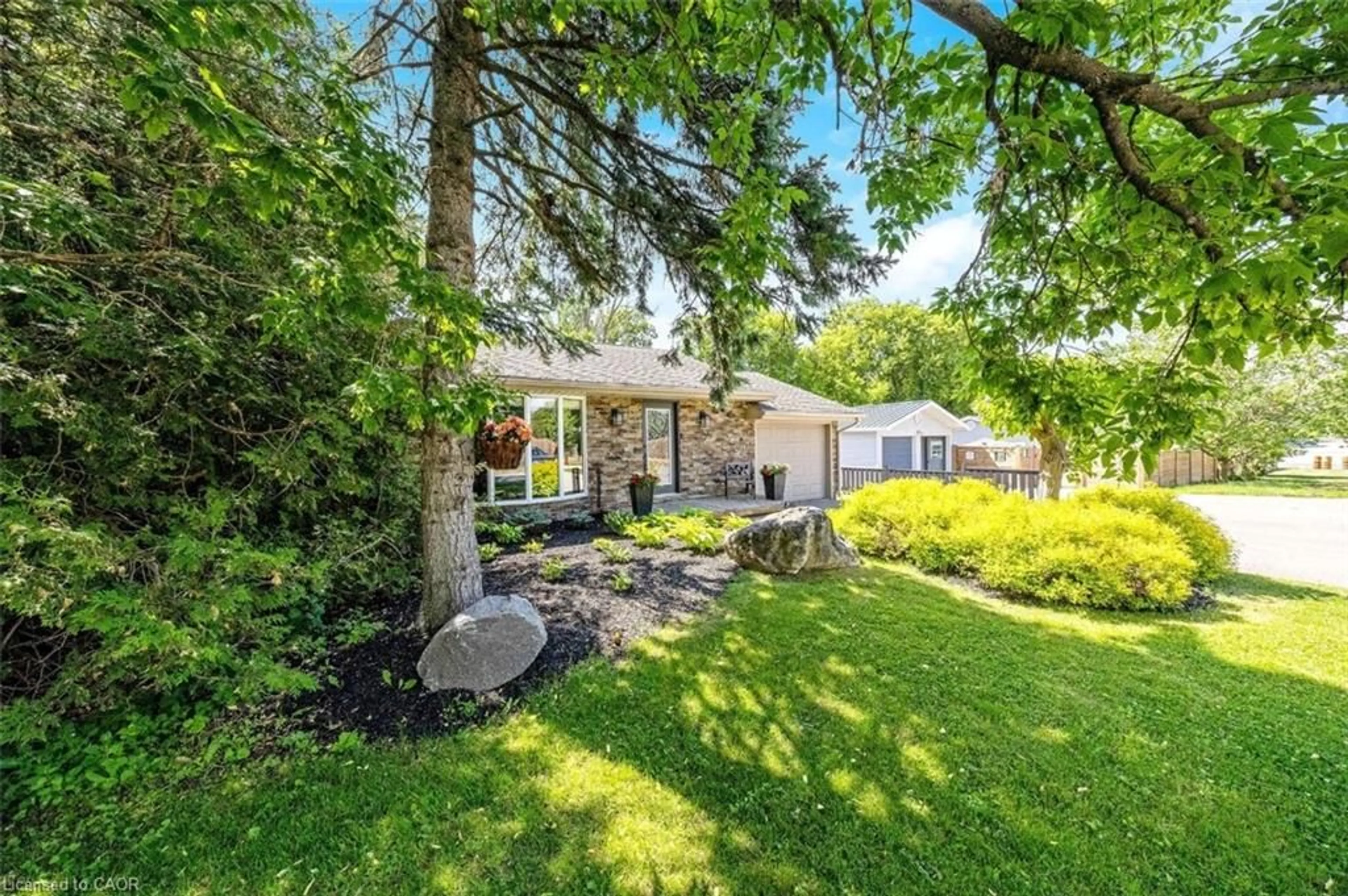 A pic from outside/outdoor area/front of a property/back of a property/a pic from drone, street for 3 Lorne St, Wellington Ontario N0B 1T0