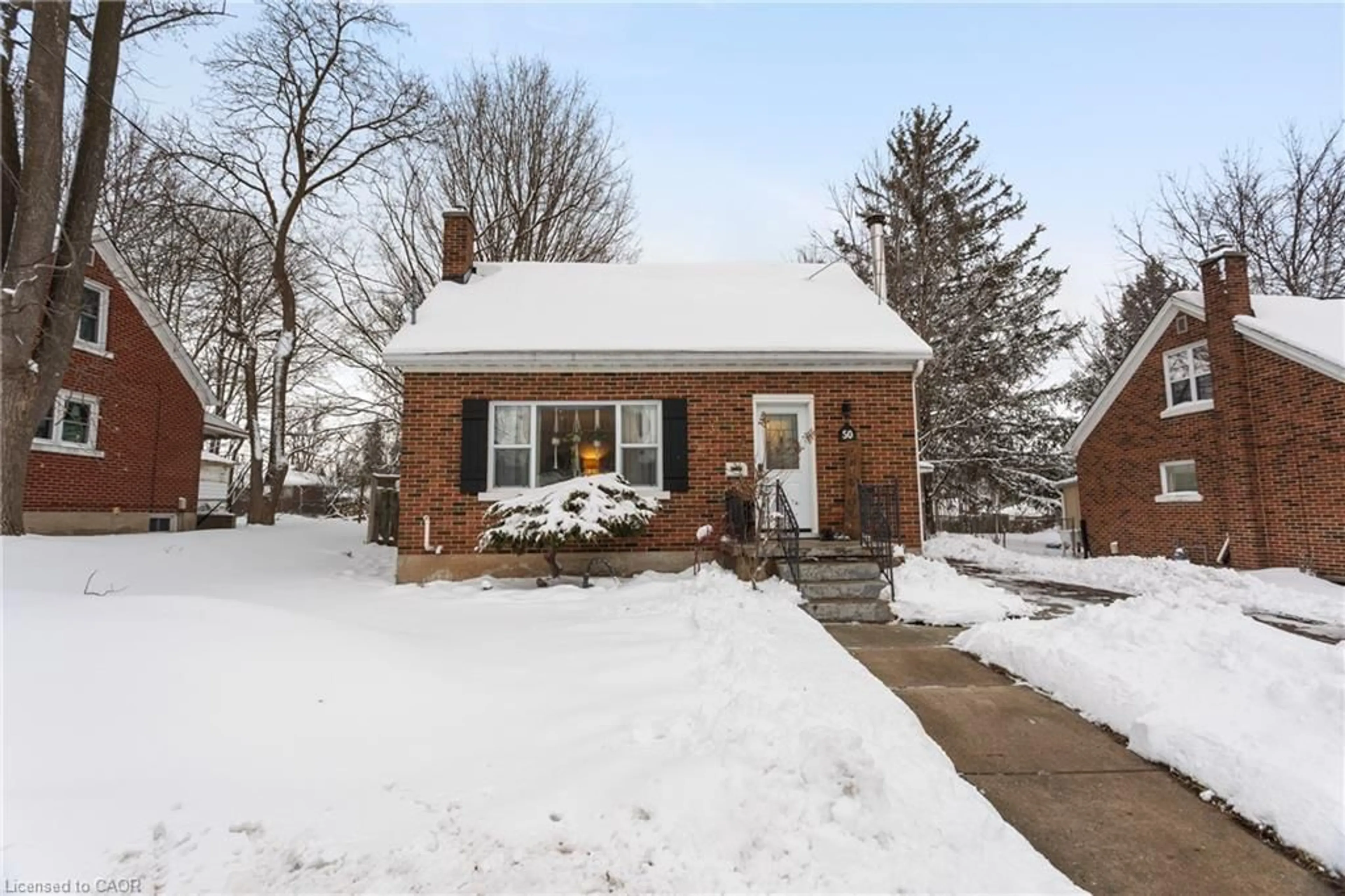 Home with brick exterior material, street for 50 Columbia St, Waterloo Ontario N2L 3K5