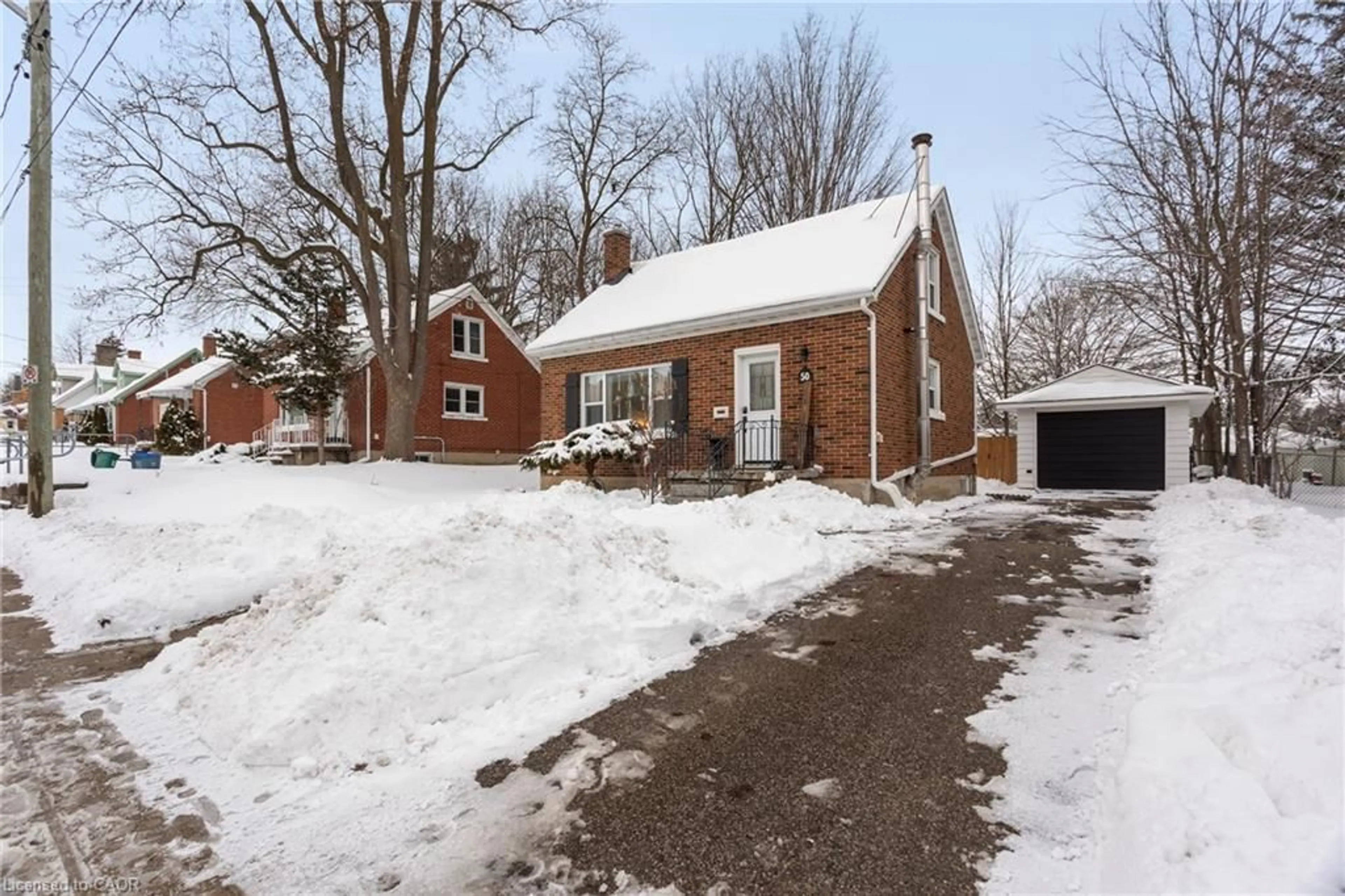 Home with brick exterior material, street for 50 Columbia St, Waterloo Ontario N2L 3K5