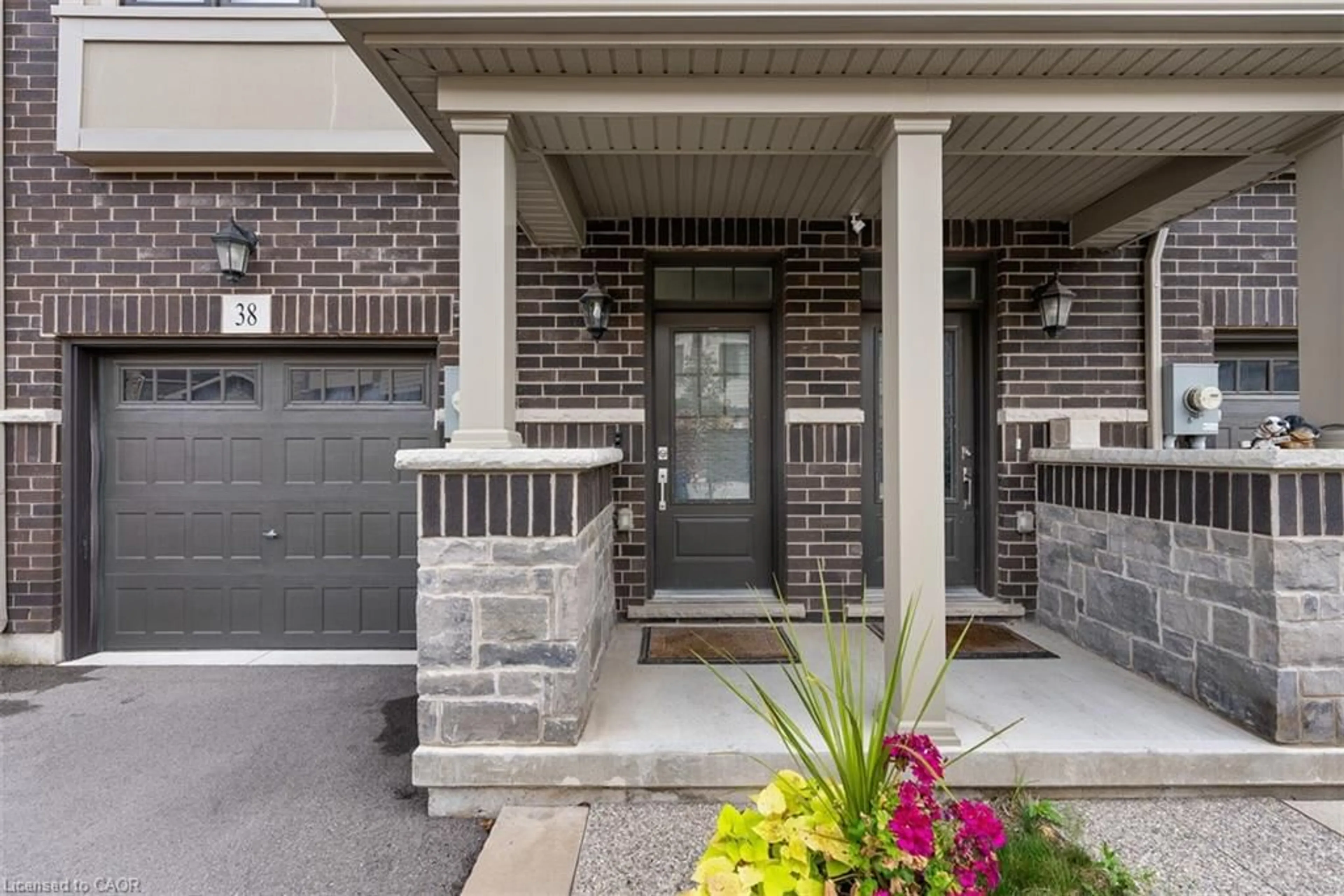 Home with brick exterior material, street for 38 Hibiscus Lane, Hamilton Ontario L8K 0A4