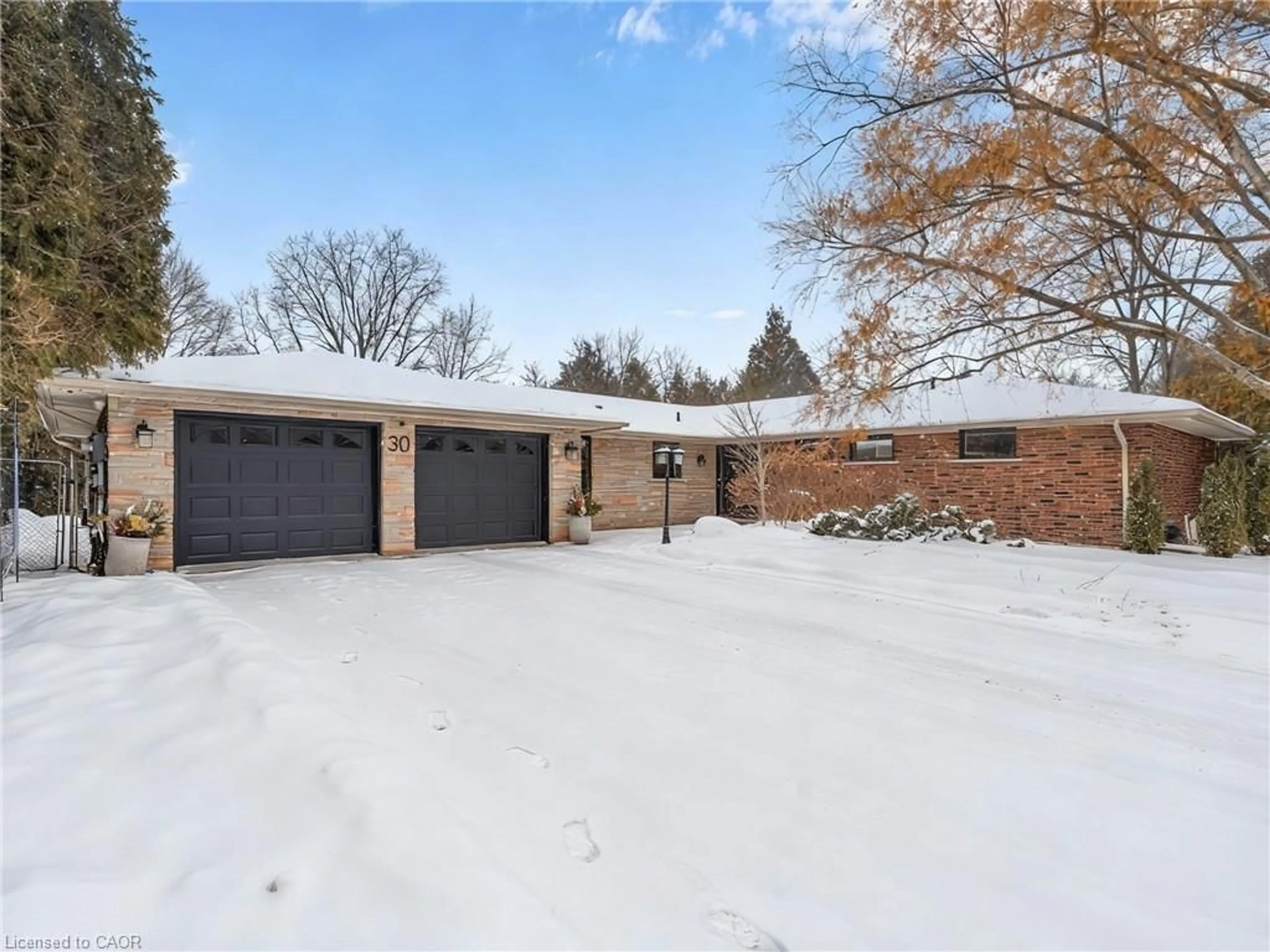 Home with brick exterior material, street for 30 Carl Cres, Waterdown Ontario L8B 0G5