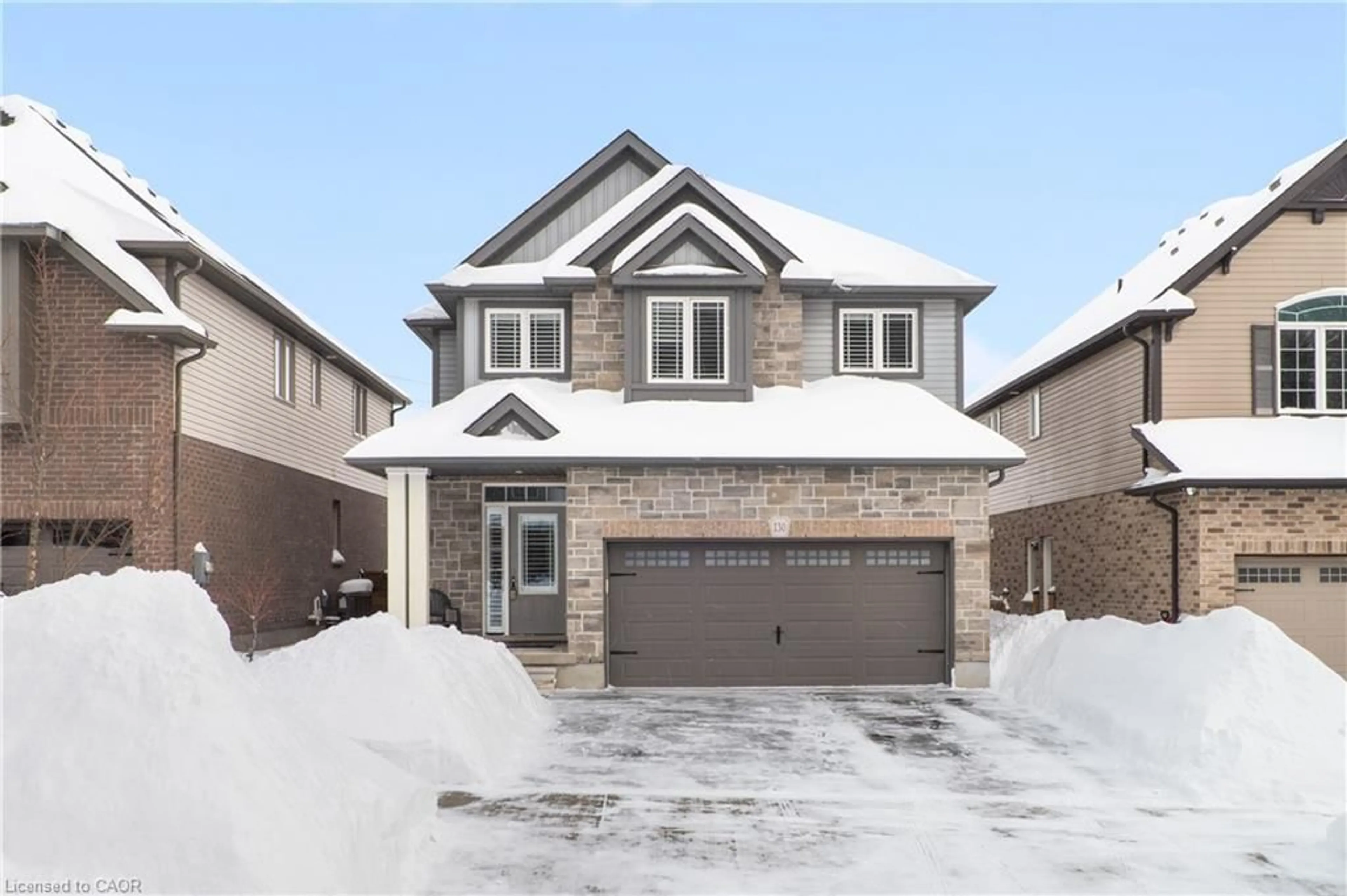 Home with brick exterior material, street for 130 Elmbank Trail, Kitchener Ontario N2R 0H2