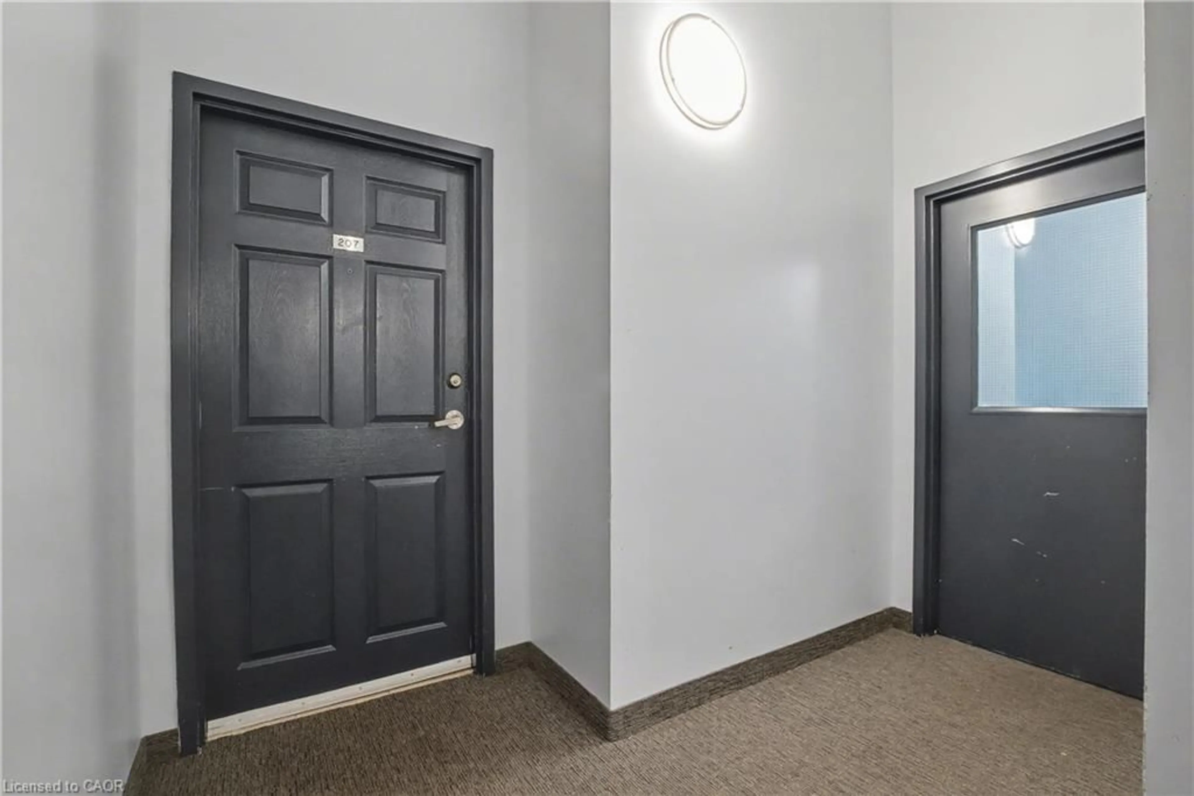 Indoor foyer for 6365 Drummond Rd #207, Niagara Falls Ontario L2G 4N1