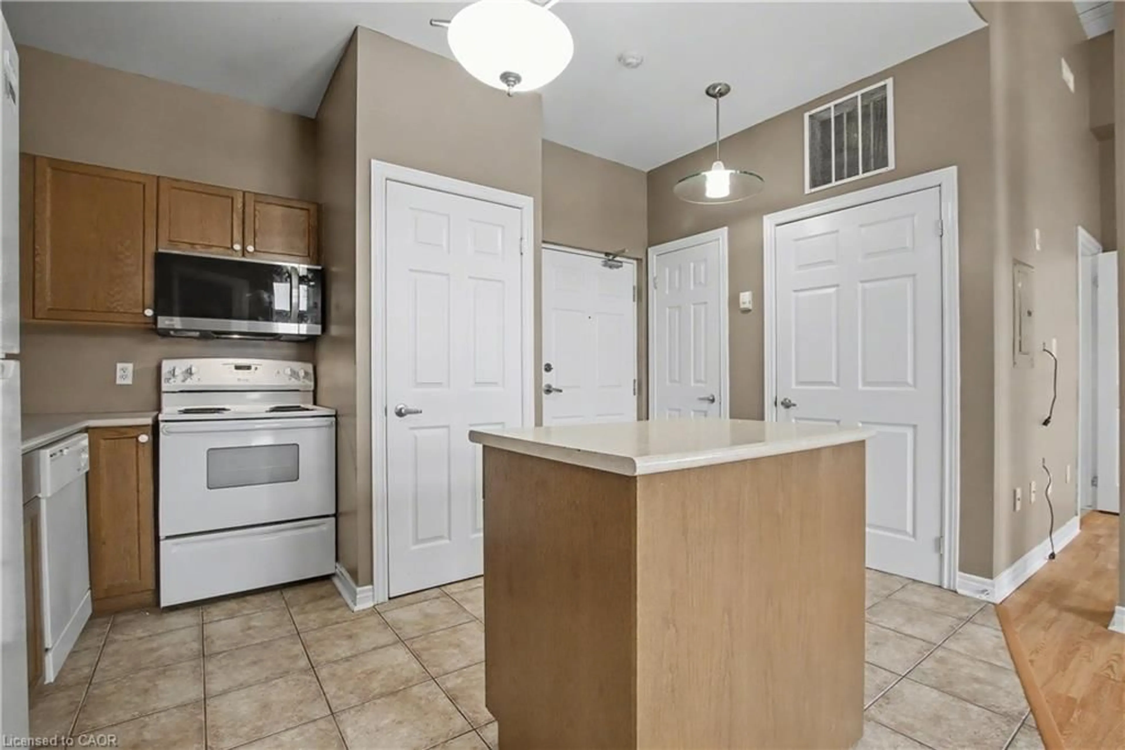 Standard kitchen, ceramic/tile floor for 6365 Drummond Rd #207, Niagara Falls Ontario L2G 4N1