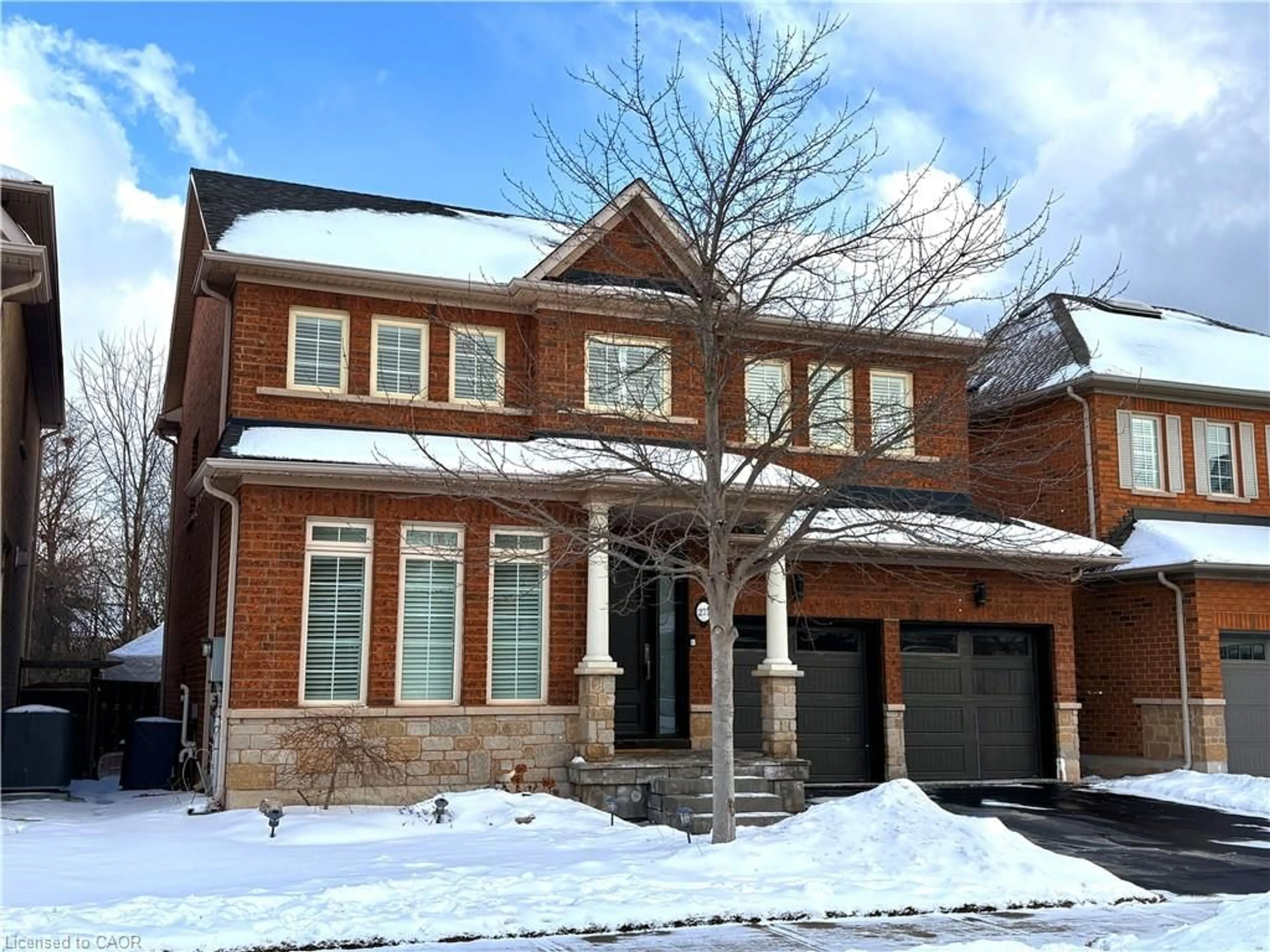 Home with brick exterior material, street for 273 Duskywing Way, Oakville Ontario L6L 6X5