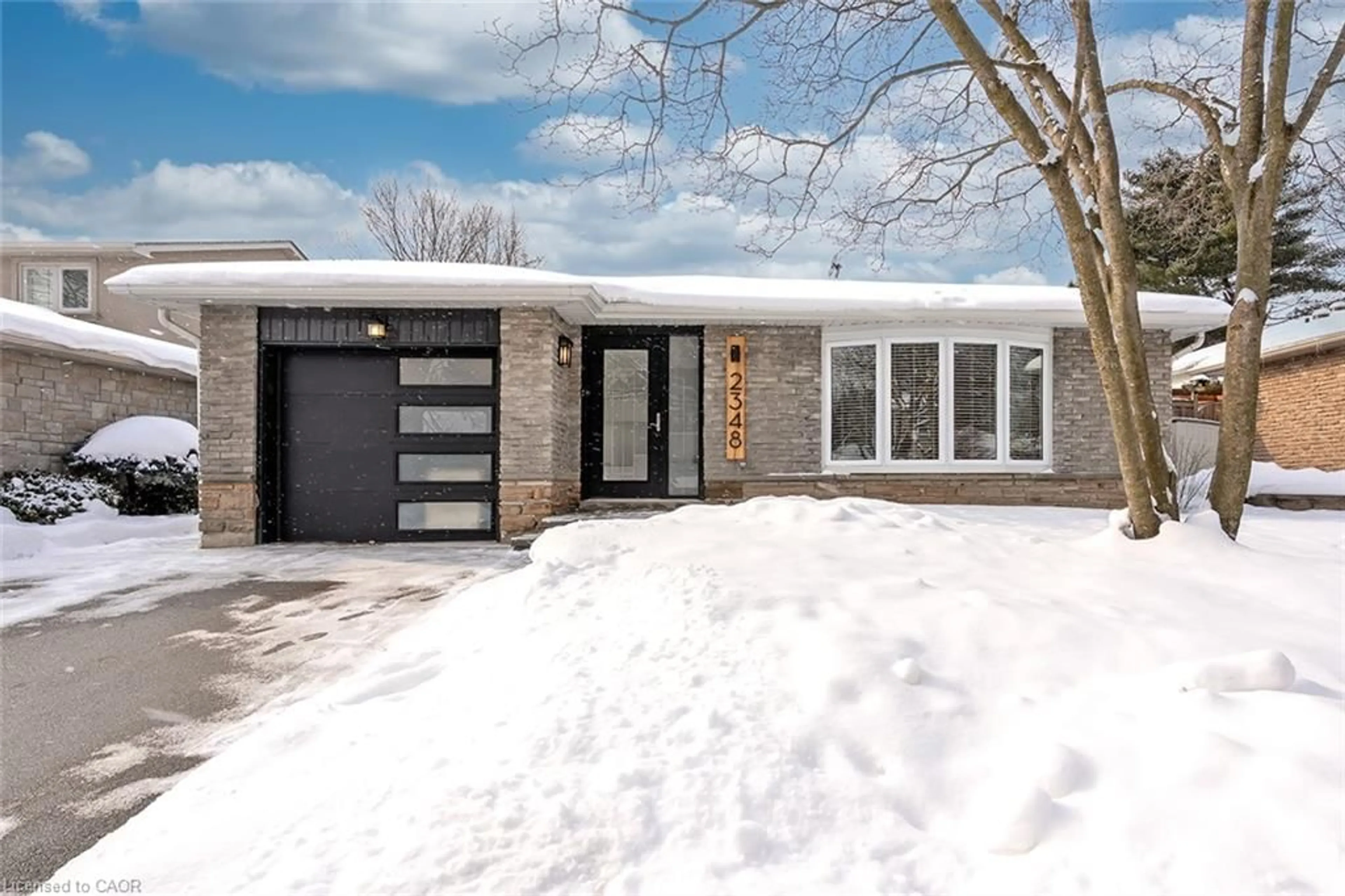 Home with brick exterior material, street for 2348 Devon Rd, Oakville Ontario L6J 5R5