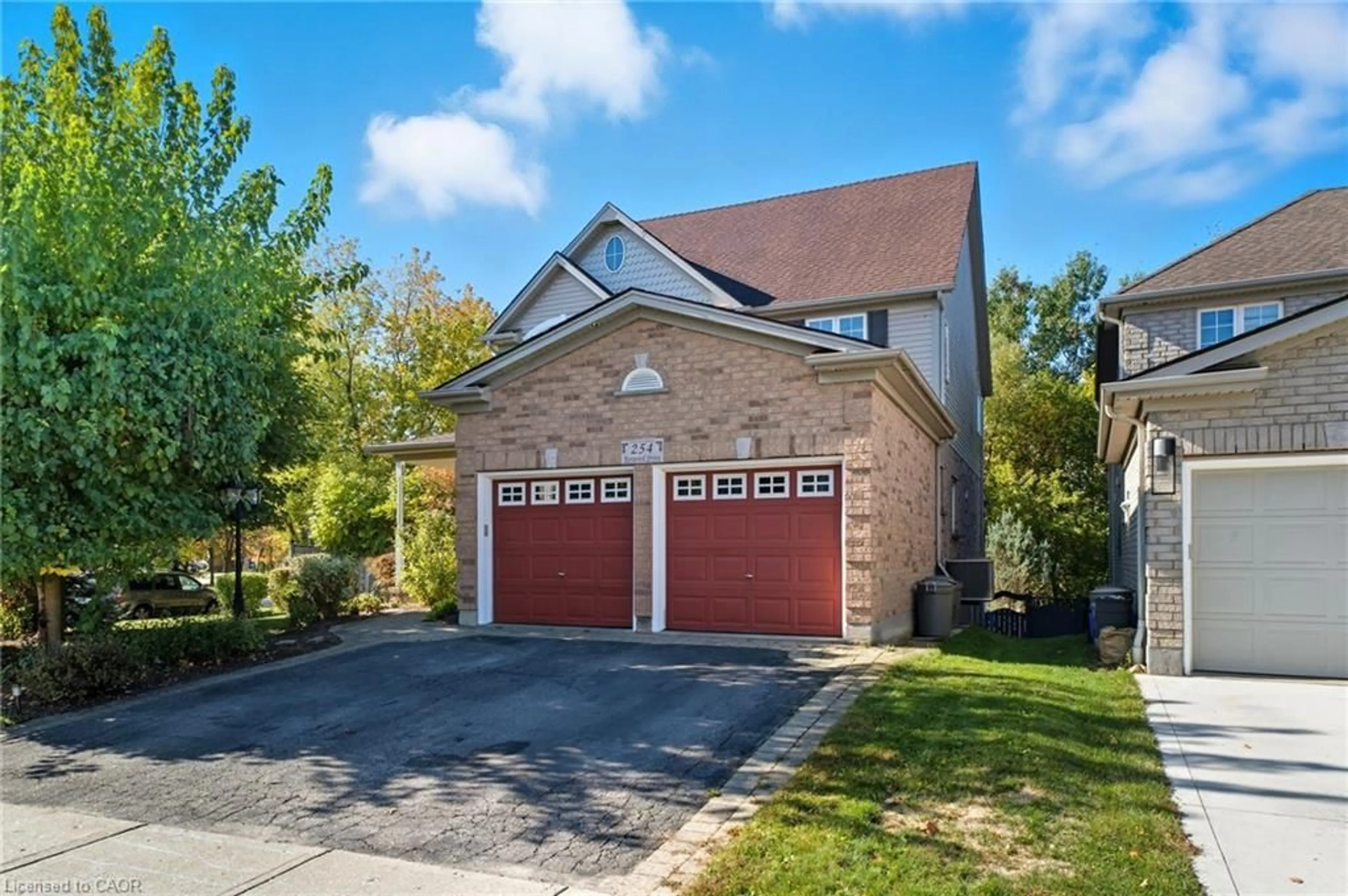 Home with brick exterior material, street for 254 Kerwood Dr, Cambridge Ontario N3C 4M5