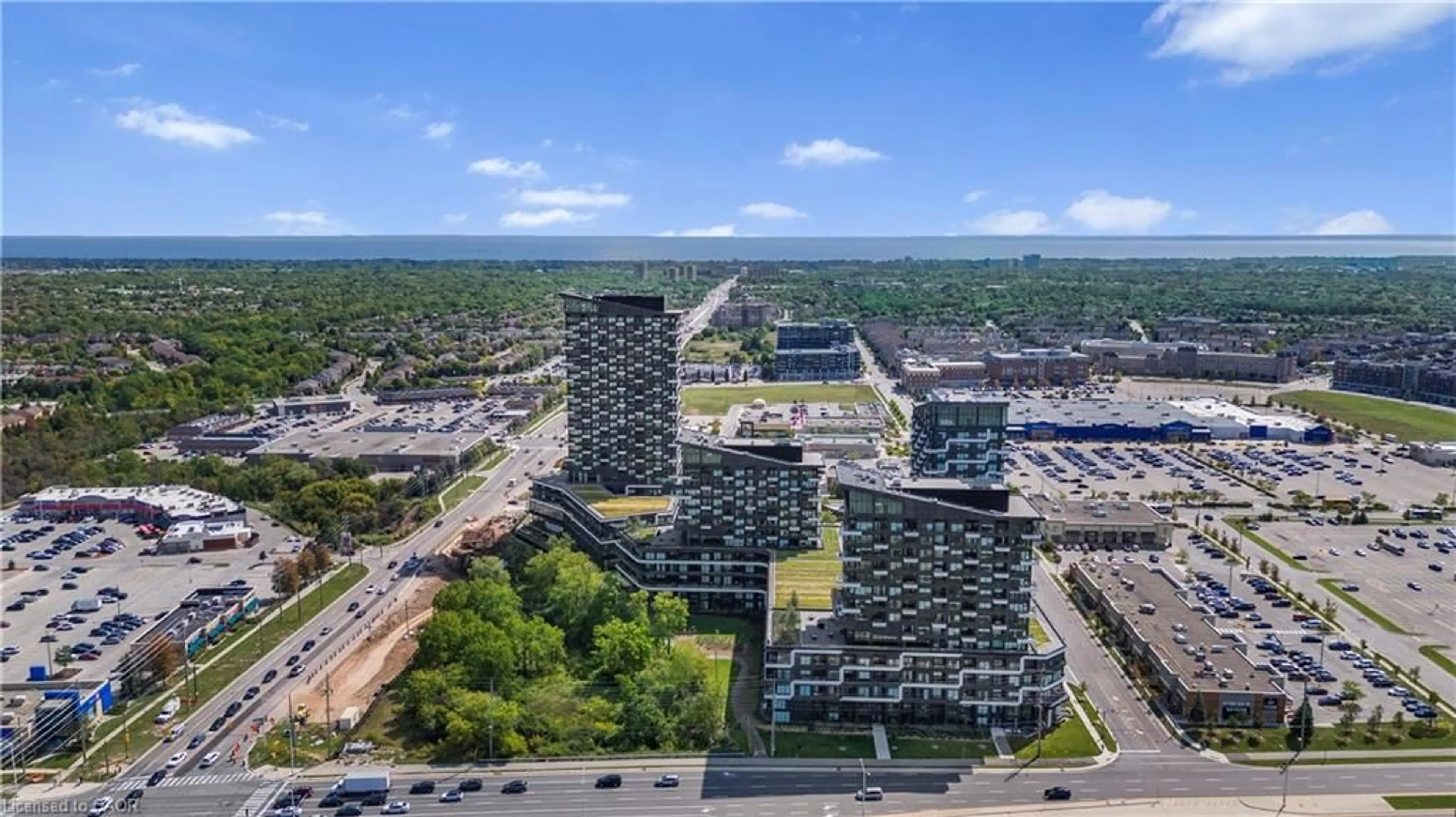 A pic from outside/outdoor area/front of a property/back of a property/a pic from drone, city buildings view from balcony for 297 Oak Walk Dr #906, Oakville Ontario L6H 6Z3