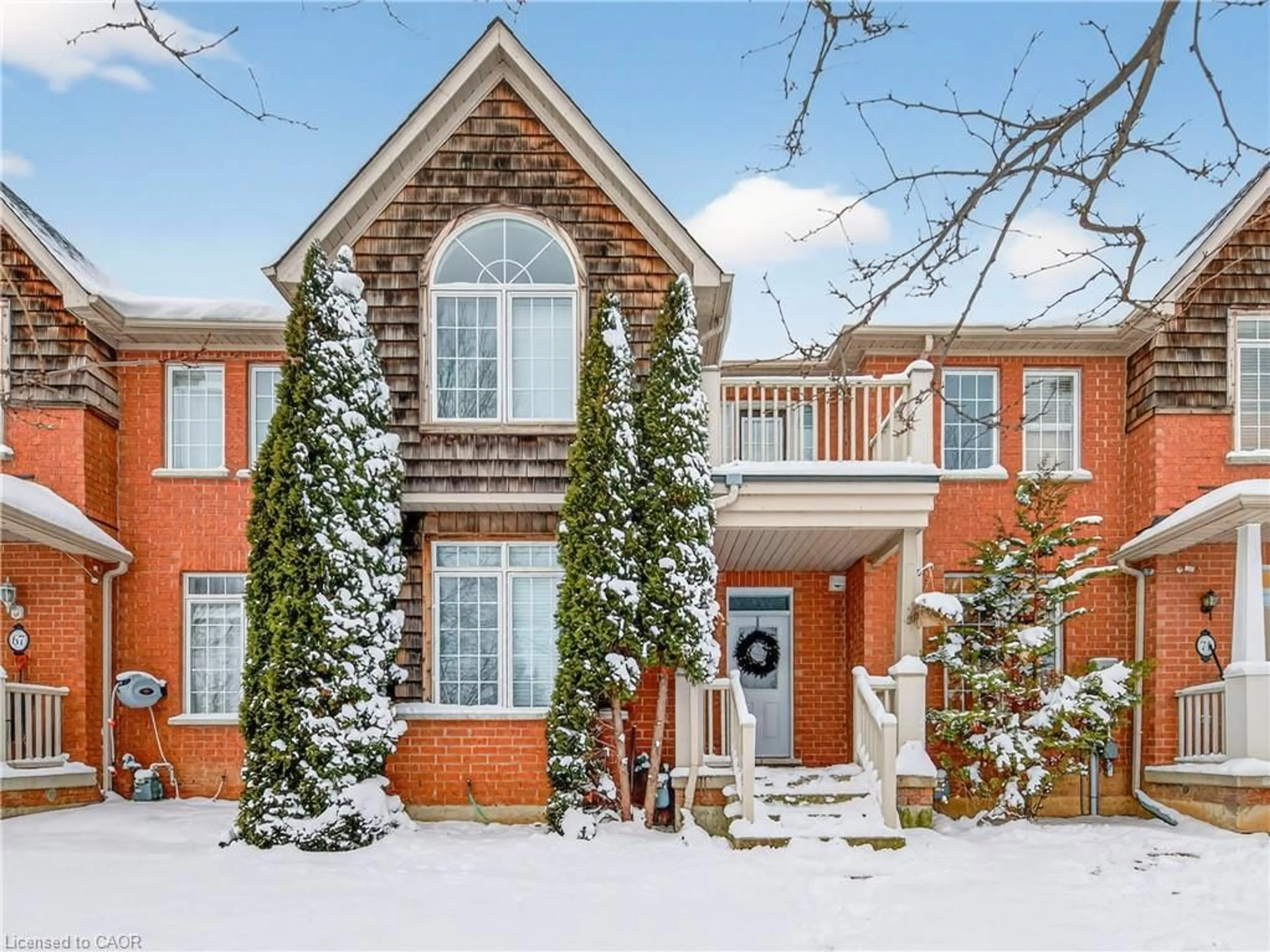 Home with brick exterior material, street for 69 Westhampton Way, Hamilton Ontario L8E 6C5